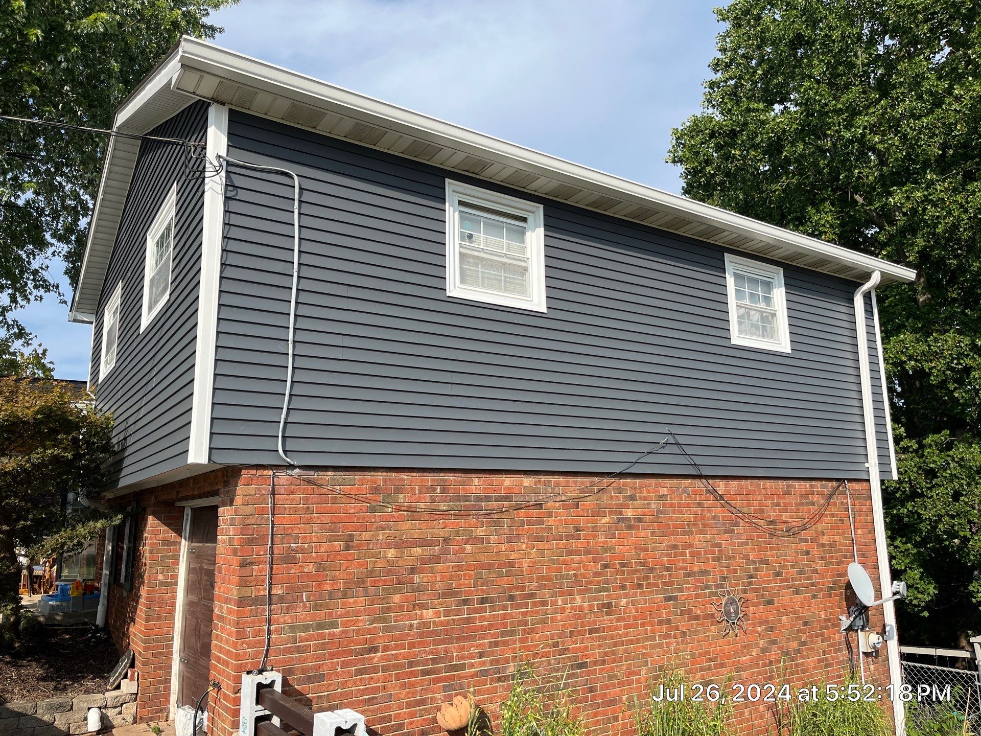 Siding Installation using Mastic Plygem Carvedwood by Fahey Roofing + Contracting