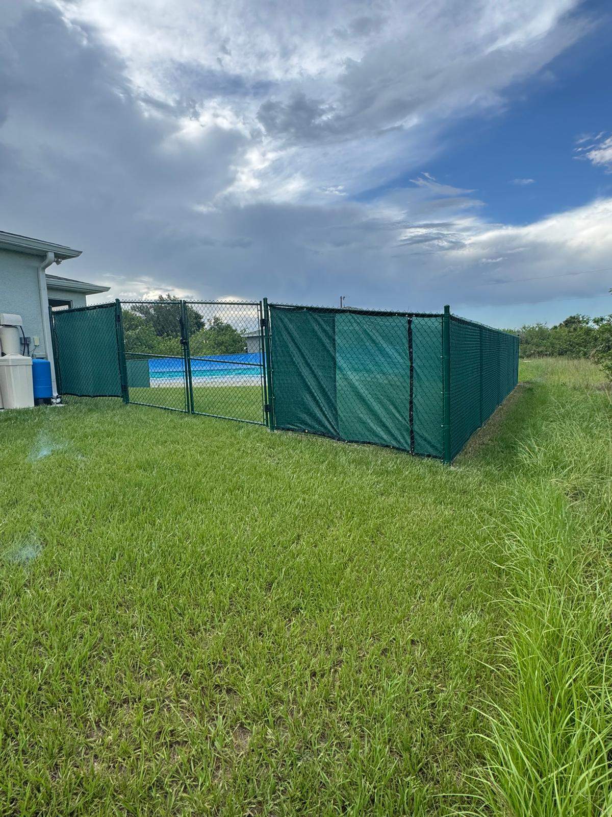 Chain Link Fence Installation with Custom Beach Privacy Screen in Port Charlotte by True Fence LLC