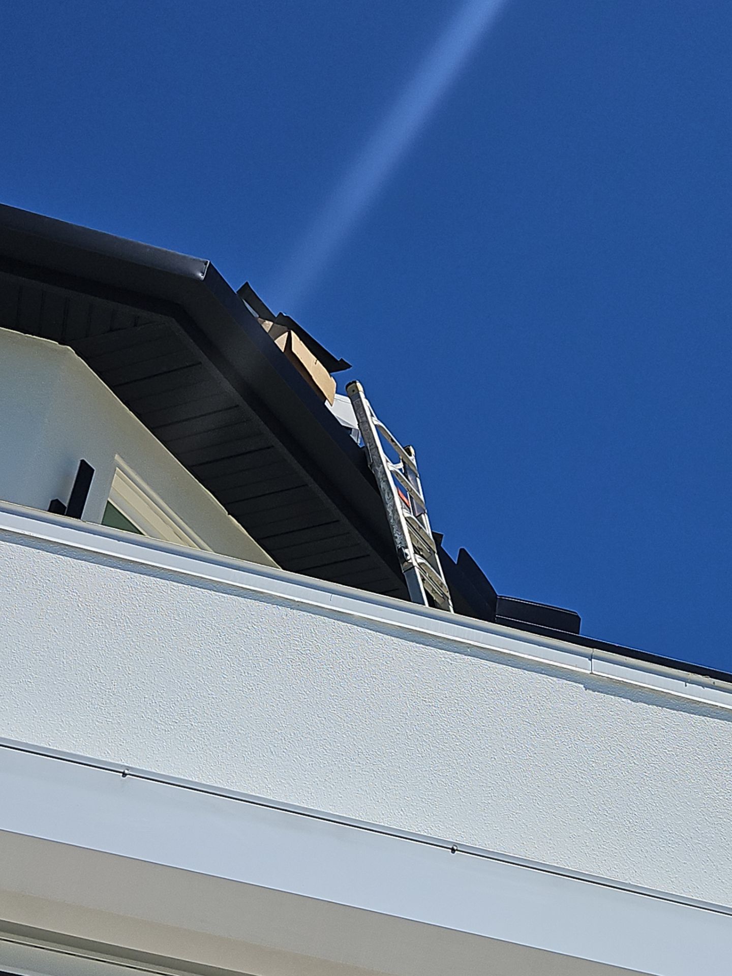 Soffit and Fascia Installation and black seamless gutters in Sarasota FL by Gutter Professors