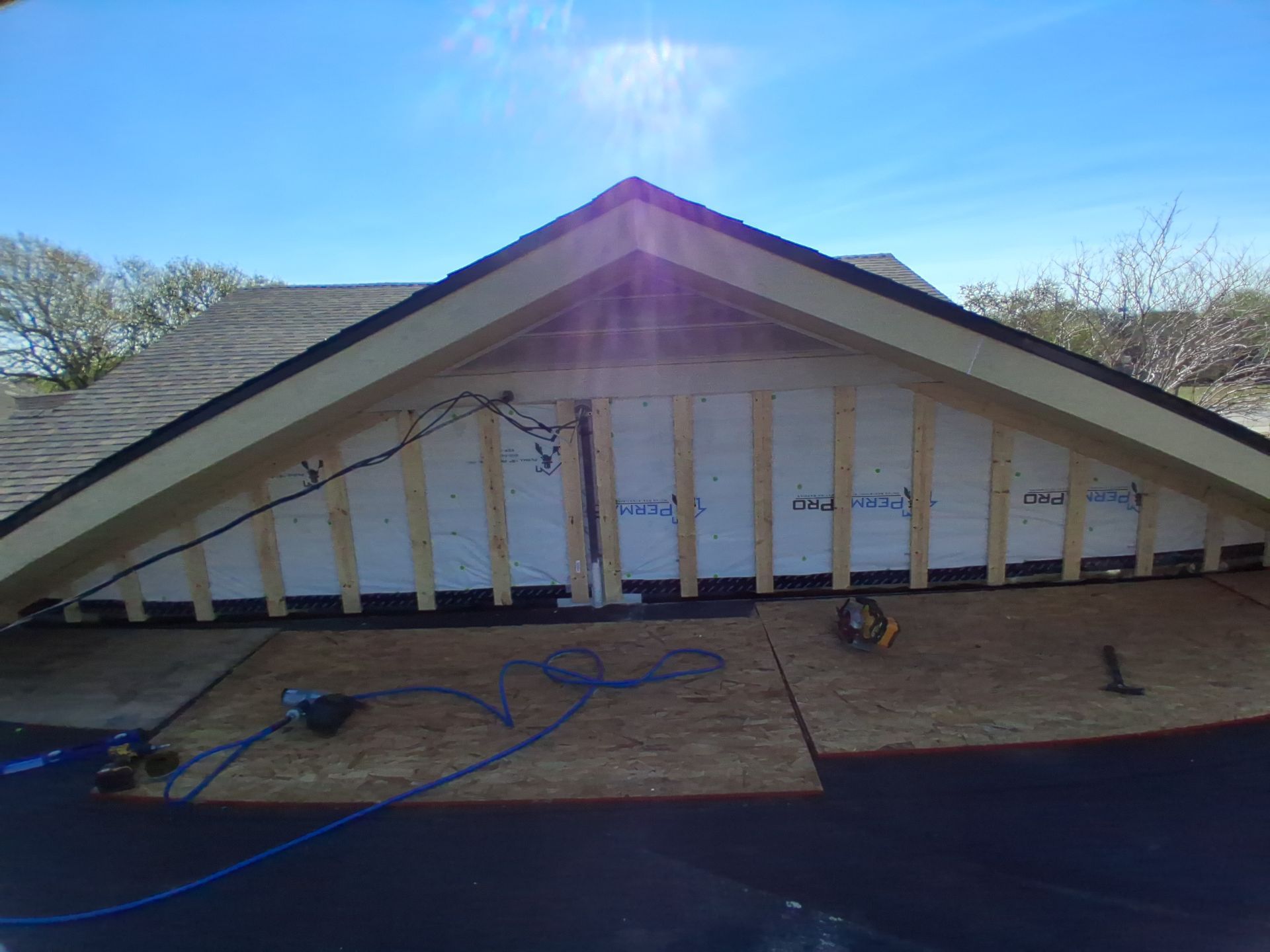 Mid-Century Bungalow by Bayfront Roofing and Construction