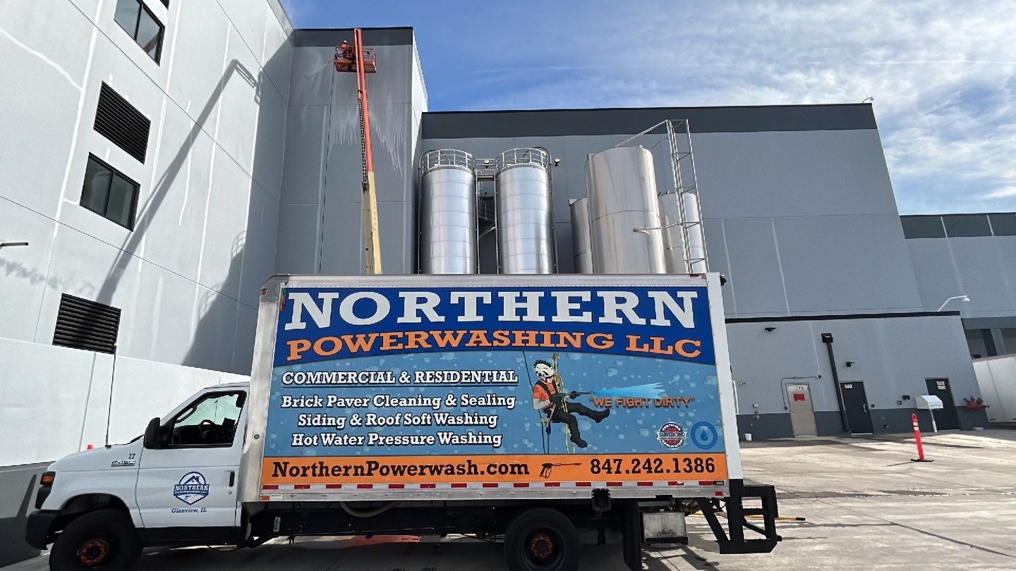 Oil removal using hot water and environmentally friendly degreaser by Northern Power Washing LLC.