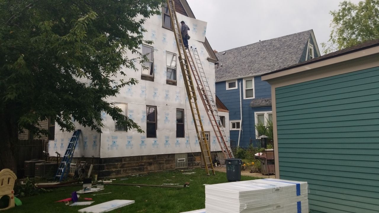 James Hardie Siding on Antique Home by Absolute Roofing and Construction