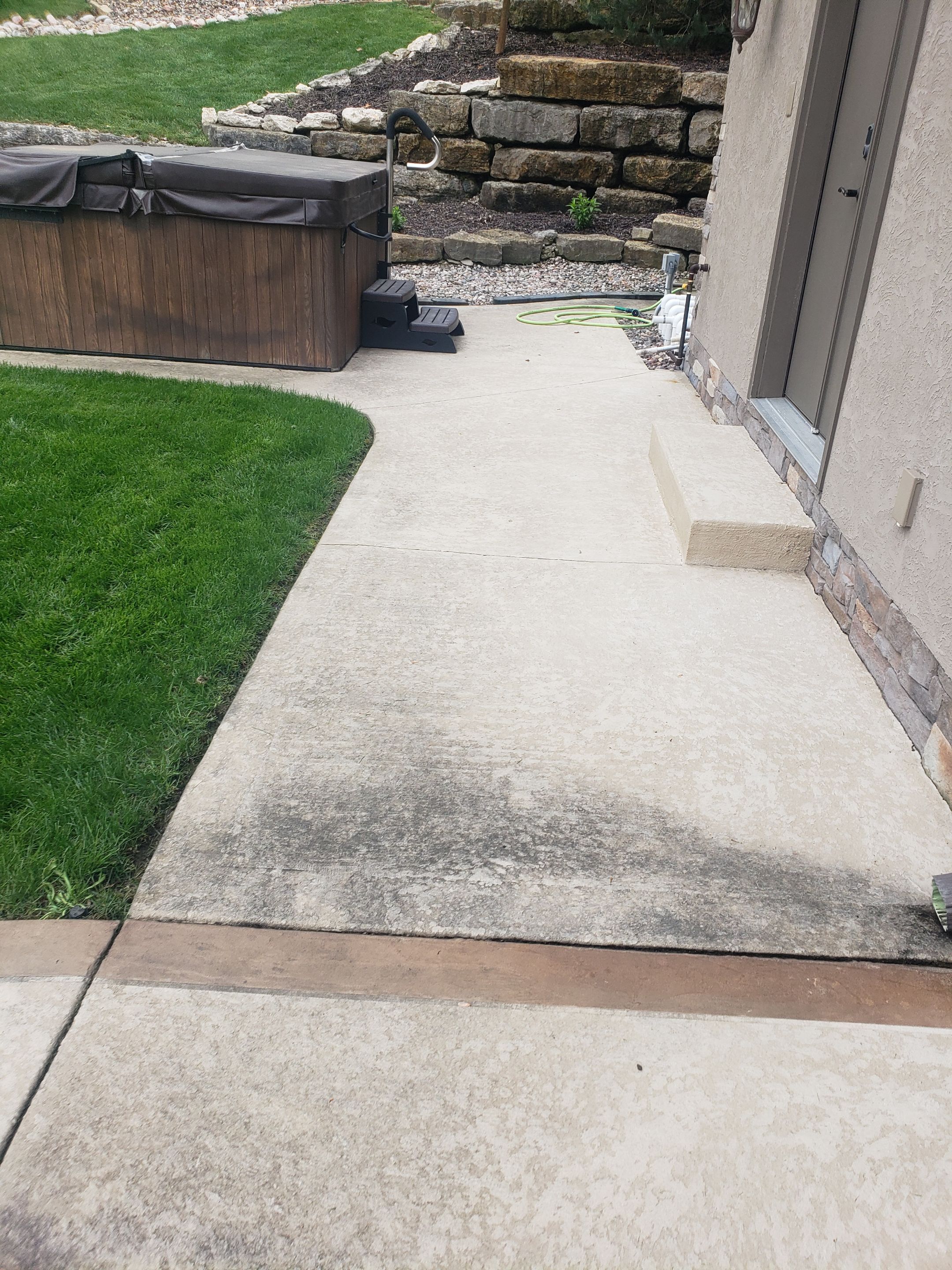 Lake Lotawana -- Front Walkway and Back Patio Tuscan Overlay by Big Red Decorative Concrete, LLC
