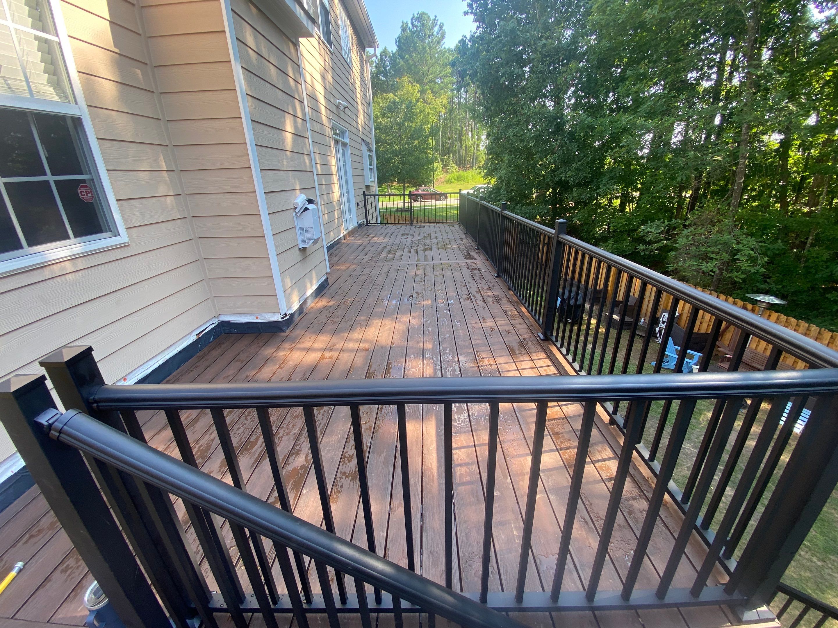 Trex Decking, Aluminum Railing, Rain Escape Underdecking by The Remodeling Company