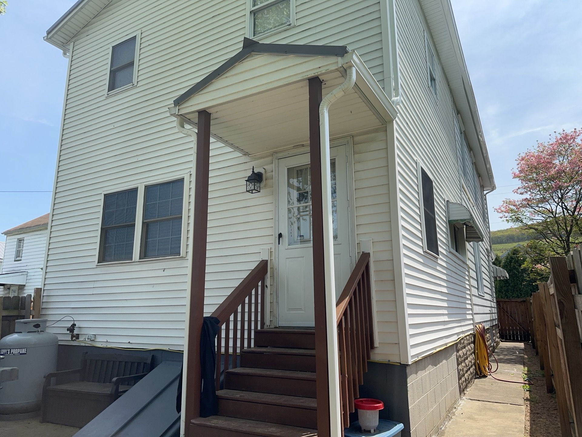 Charcoal Metal Roof & Blue Siding — A Refreshing New Look by Esh Builders