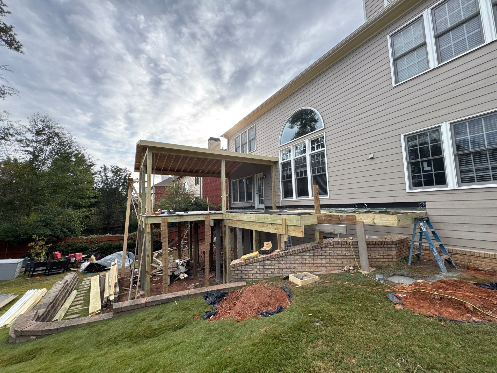 Custom Composite Deck and Covered Gabled Porch in Marietta by Swift Home Renovations
