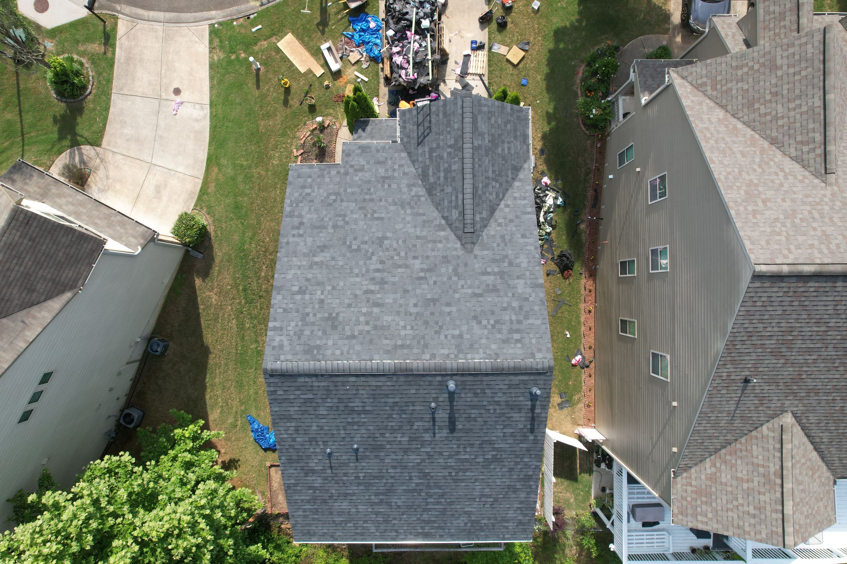 Residential Roof Replacement using Owens Corning Trudef Twilight Black by Inspector Roofing and Restoration
