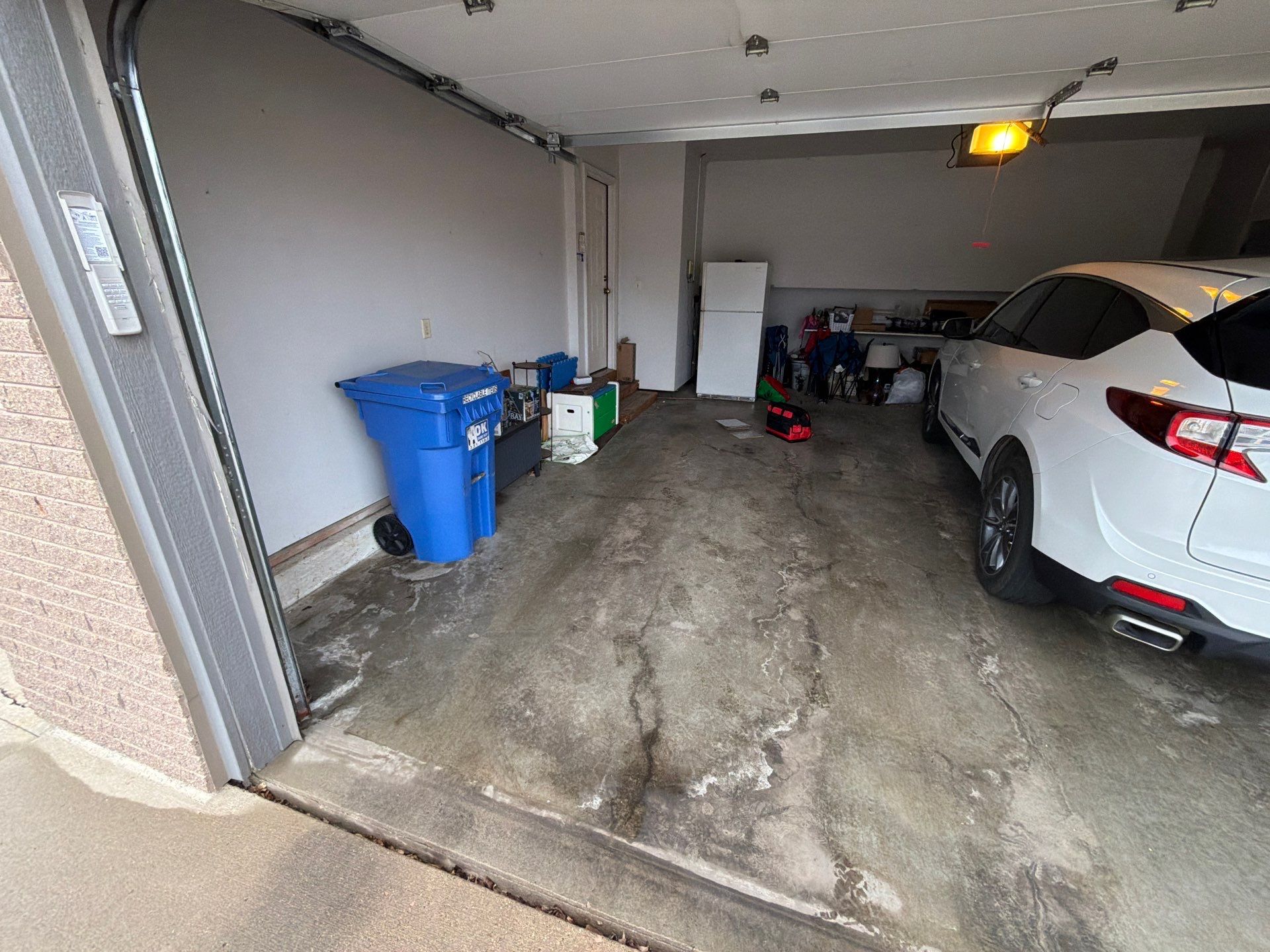 Decorative Chip Epoxy Garage Floor Coating in Sioux Falls by Select Painting, Coatings & Garage Cabinets
