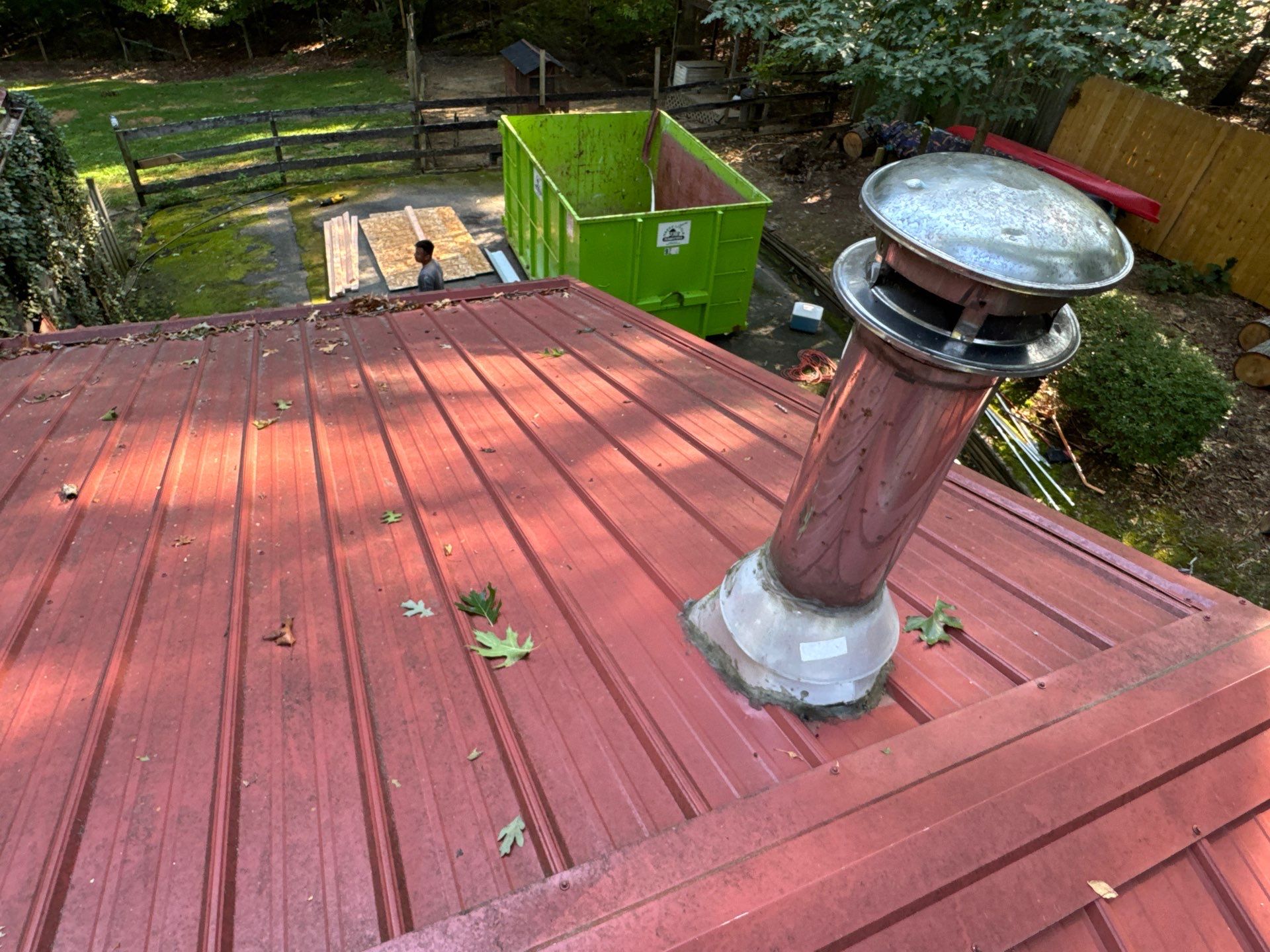 Red Metal Roof Restoration and Wood Fascia Replacement in Barboursville by Cade Construction