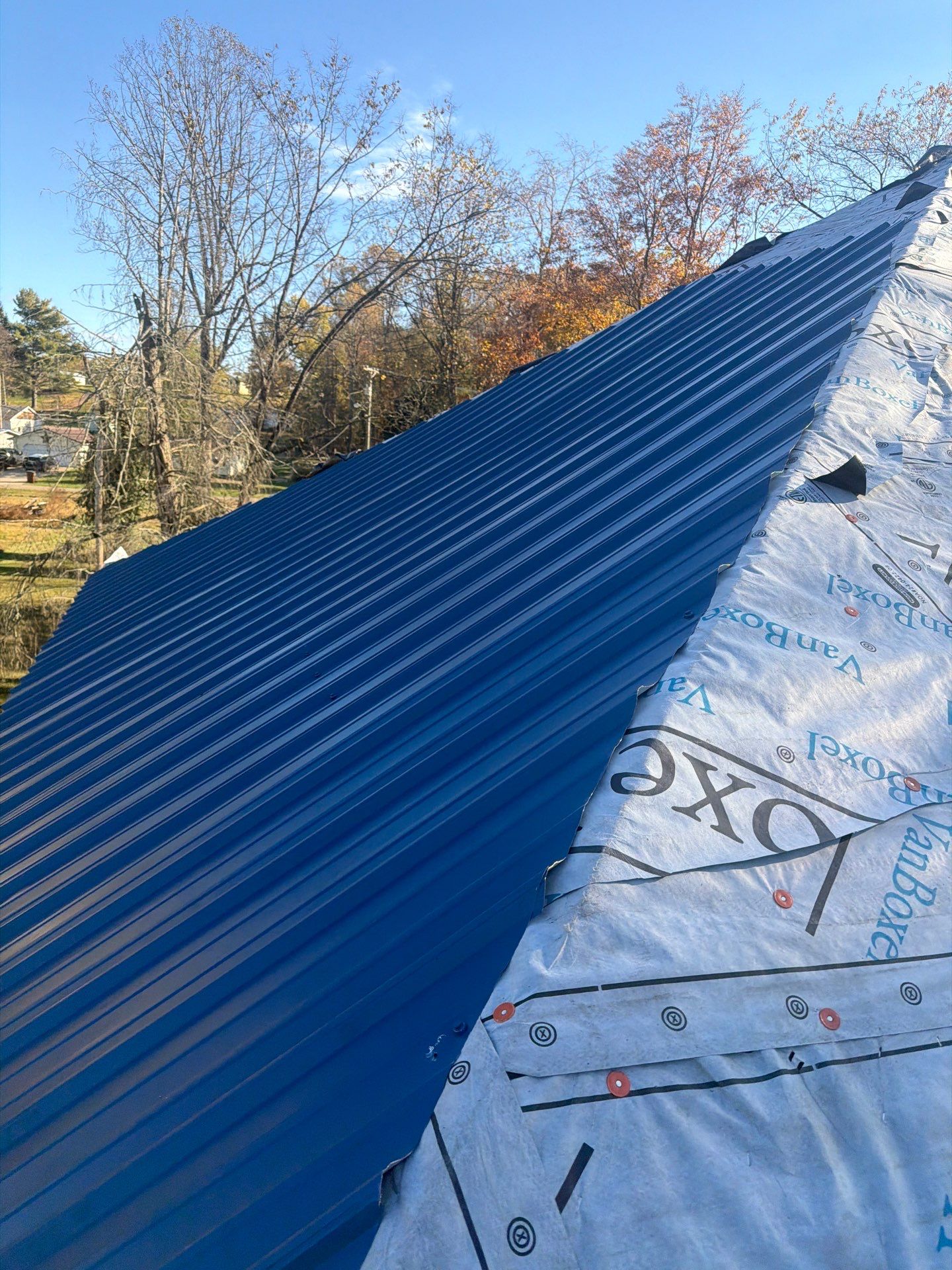 Residential Roofing Installation using Metal by Rainstoppers Roofing