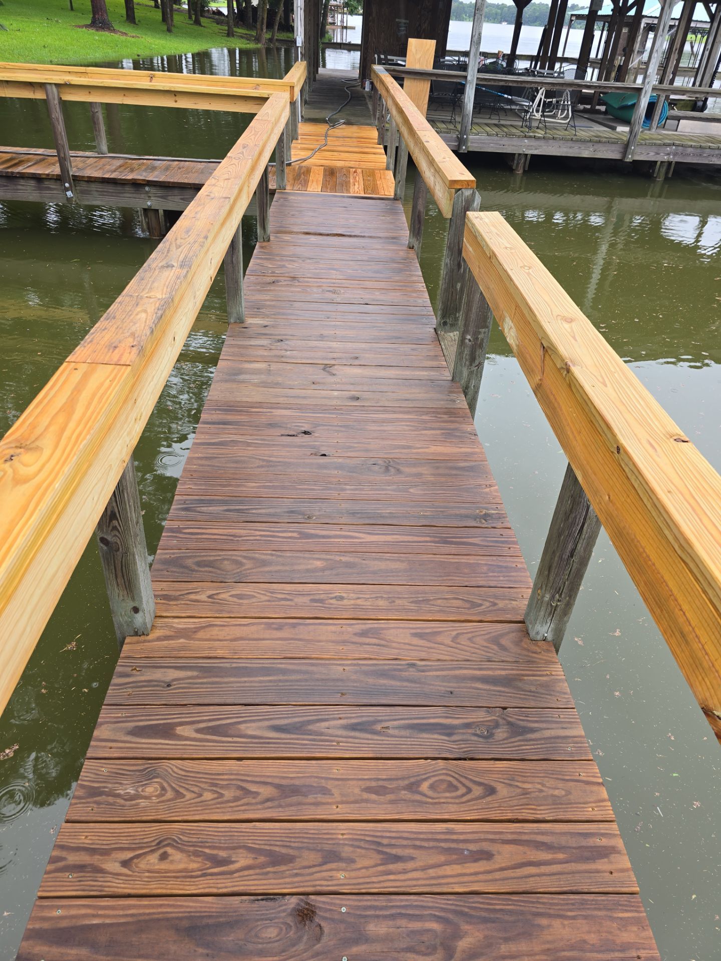 Lake House Deck Restaining in Flint, Texas by Quality Coats Painting