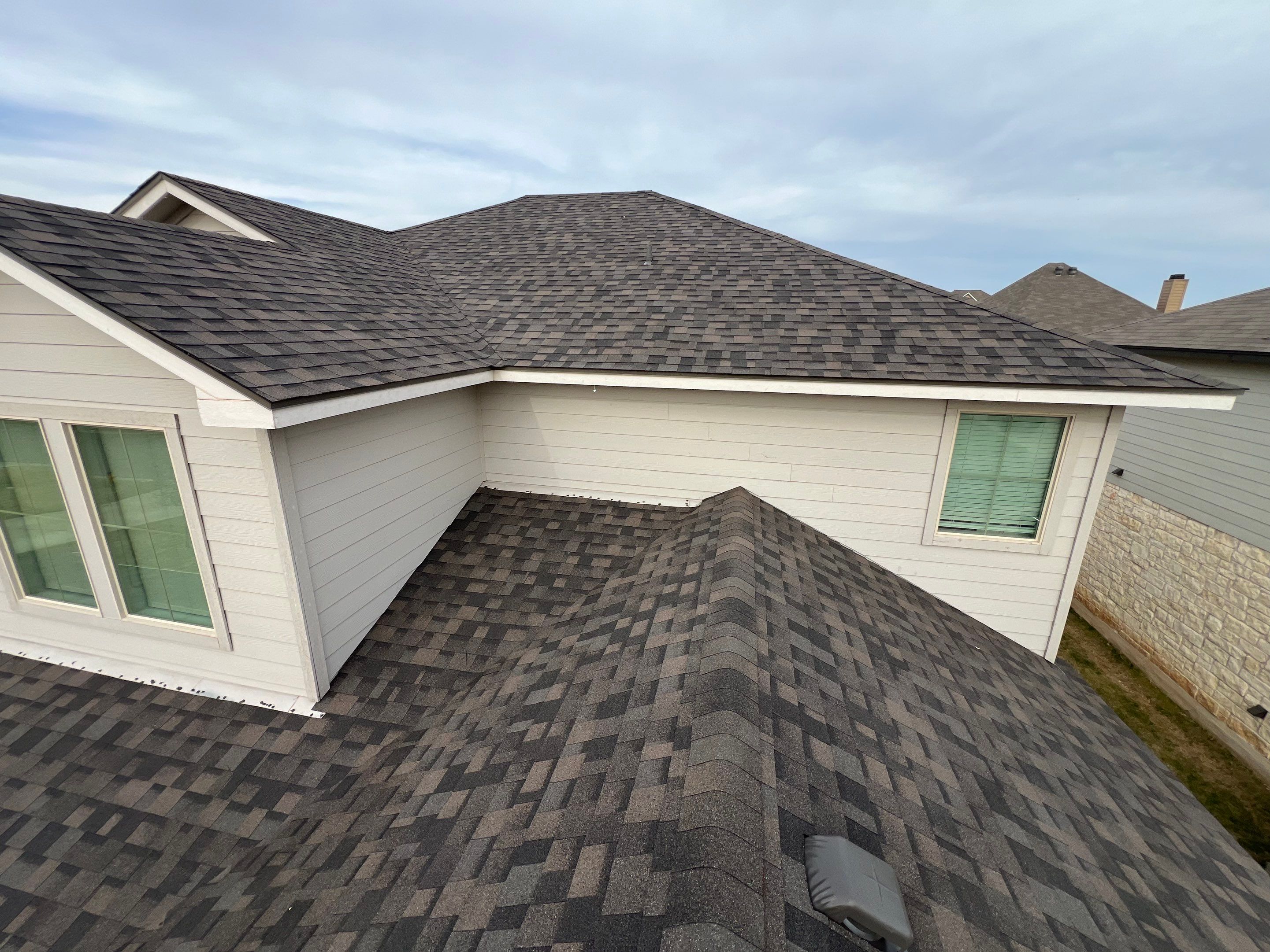 Residential Roofing Installation using IKO Dynasty Class 3 Impact Resistant 30YR Architectural Shingles. Color: Driftshake by WR Roofing Solutions