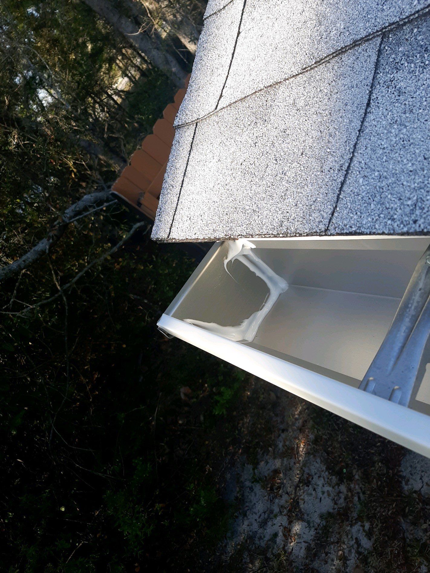 Seamless Gutter Installation Using White K-Style Gutters  by Gutter Professors
