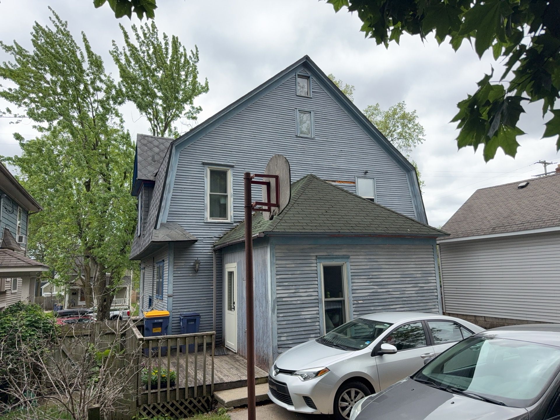 SIDING, DECK AND NEW PORCH  by Avalon Roofing and Exteriors