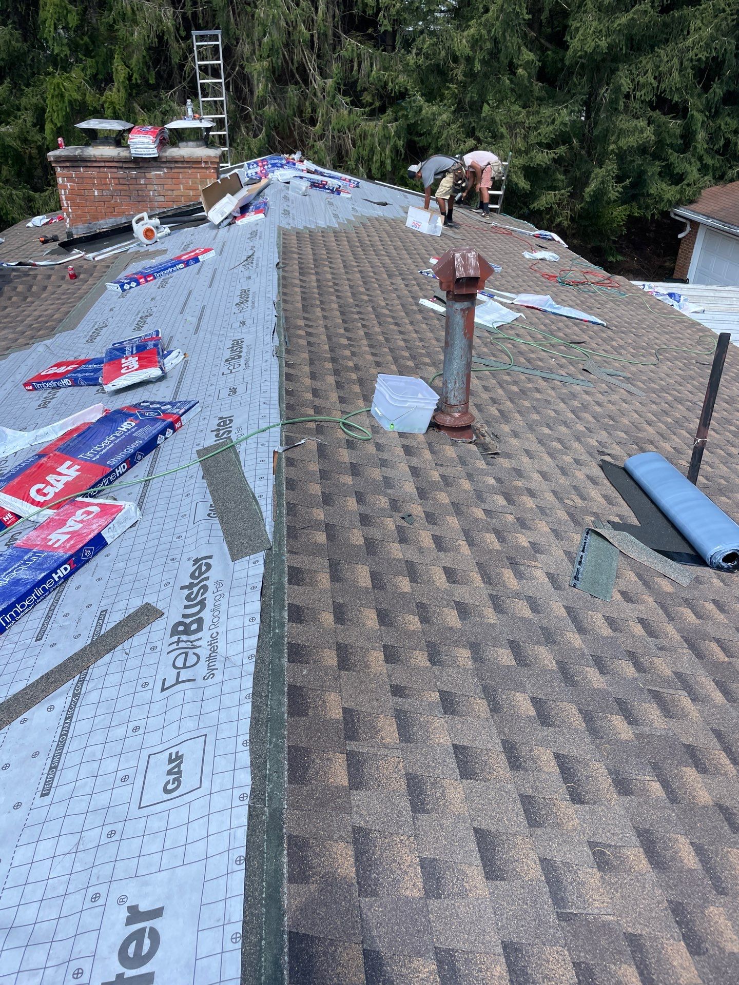 Residential Roofing Installation using GAF TImberline HDZ Hickory by Rainstoppers Roofing