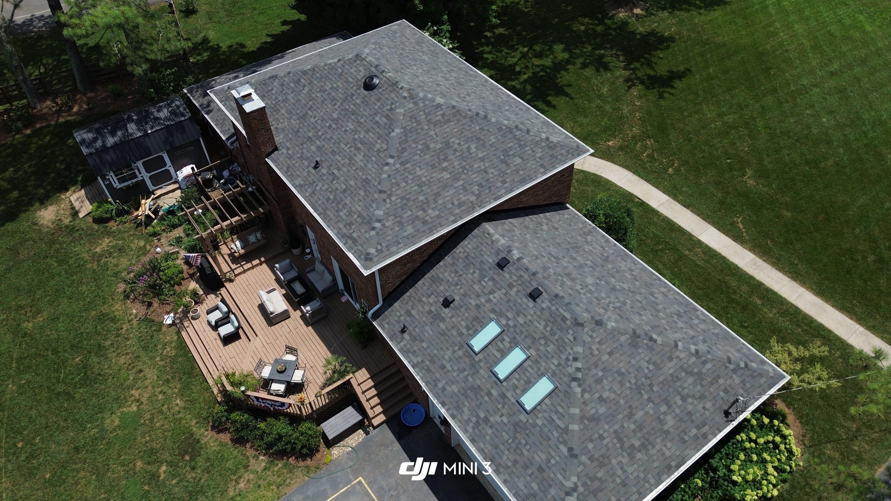 Full Roof Replacement and Skylight Installation for Franklin Colonial Home by Shinglesmiths Roofing