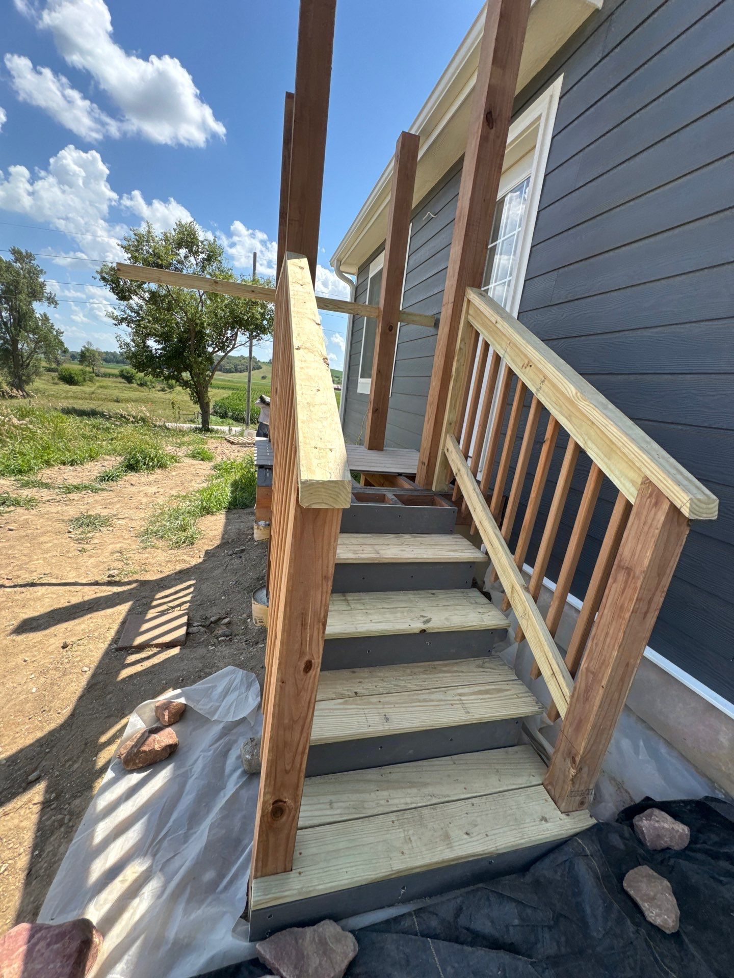 Fiber Cement Siding and Composite Deck in Tekamah, NE by Crows Roofing LLC