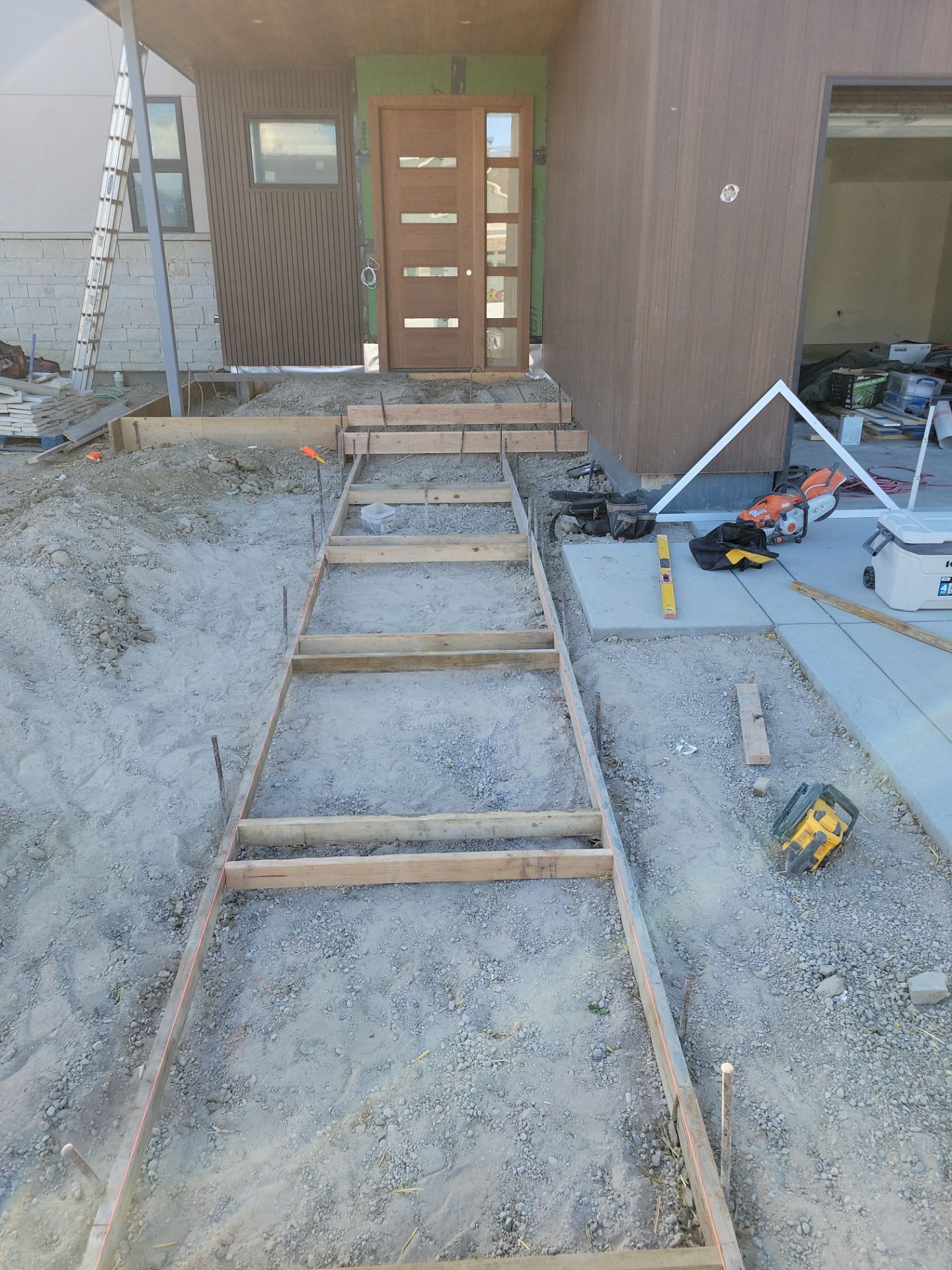 Stamped Concrete Patio and Custom Walkway Installation in Berthoud, Colorado by Center Line Concrete