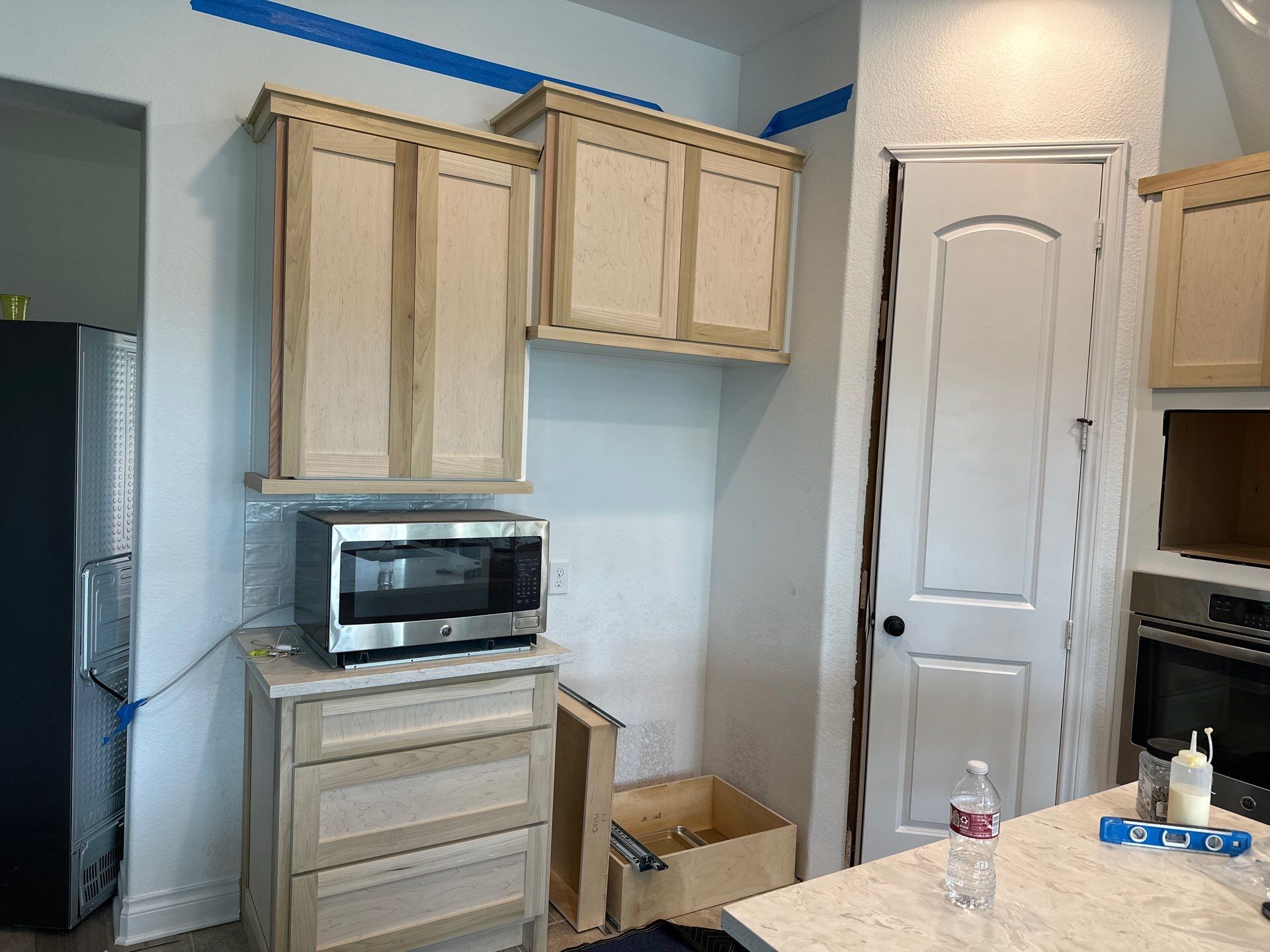 Kitchen Remodel using Water mitigation equipment by L&T General Contractors and Restoration INC