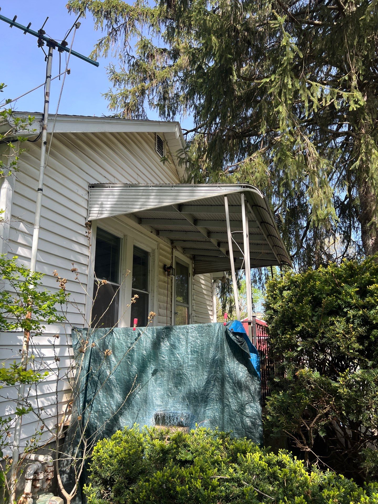 Re-roof the Art Studio nestled among the pines by SOS Home Ohio 