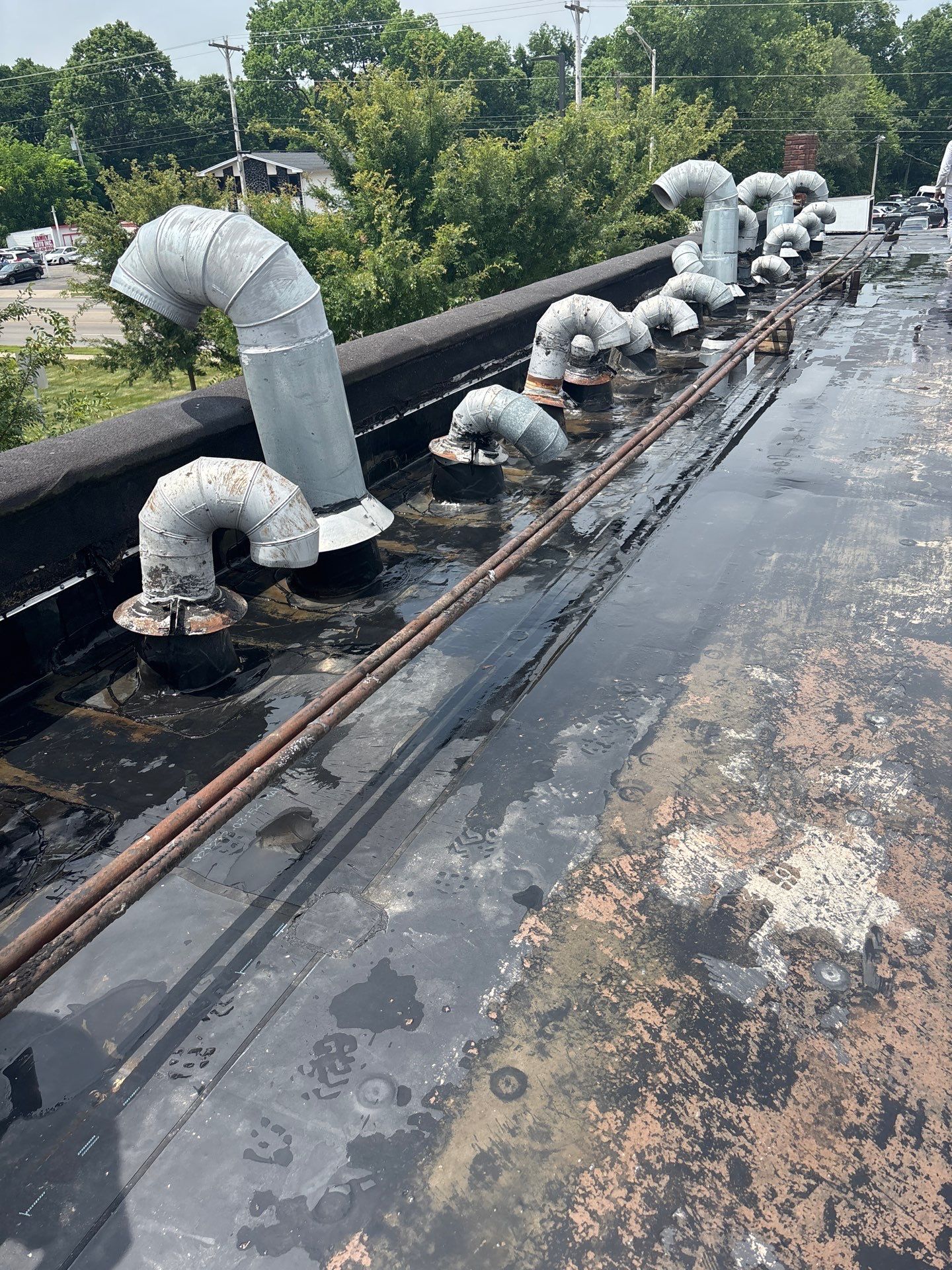 Commercial Roofing Repair using 60 mil rubber roof  by Nitro Roofing and Construction