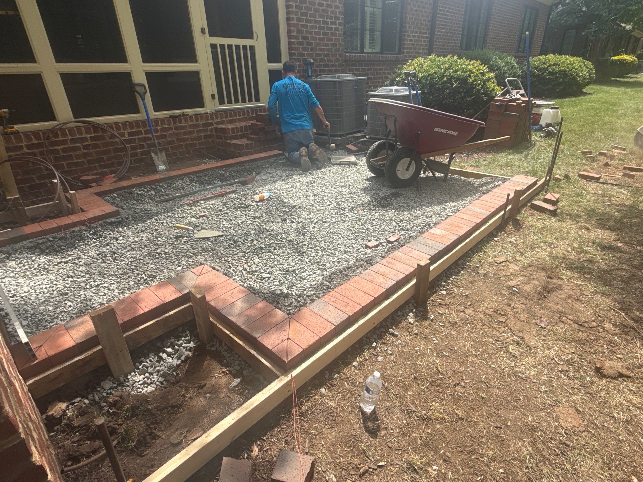 Brick patio in Durham by Martinez Brother’s Nc Landscaping Inc