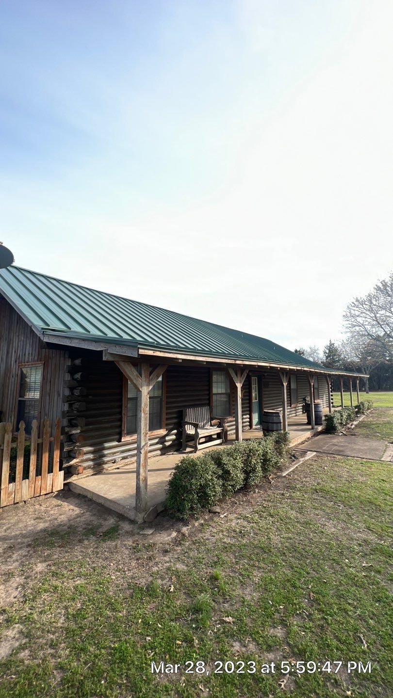 Shingle to Standing Seam Metal Roof by Springtree Restoration