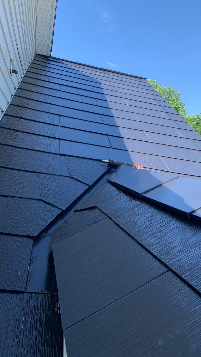 Tesla Solar Roof Replacement using Tesla Solar Roof V3 tiles by American Home Contractors