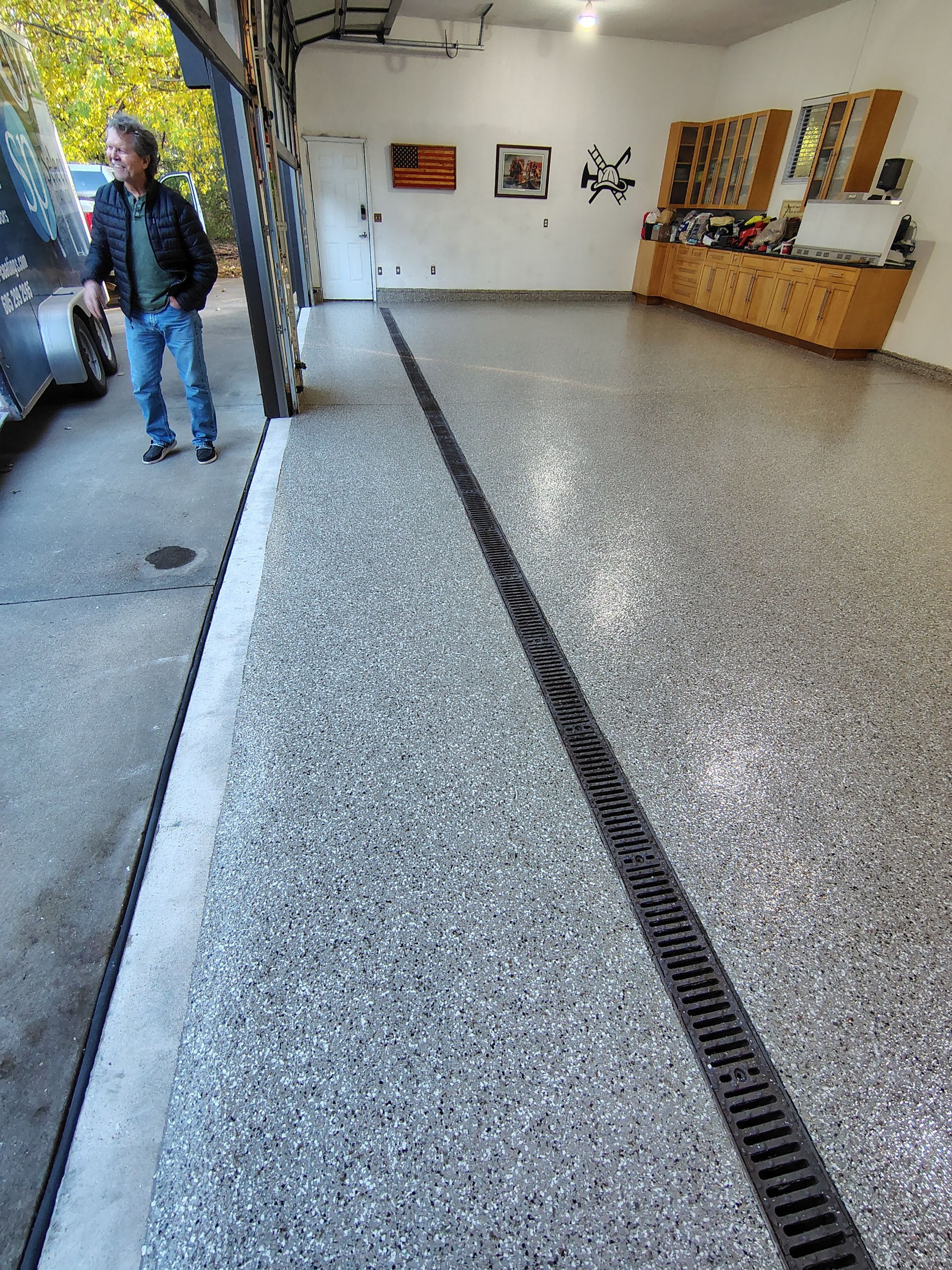 Garage Floor and Entry Step Concrete Coating in Sioux Falls by Select Painting, Coatings & Garage Cabinets