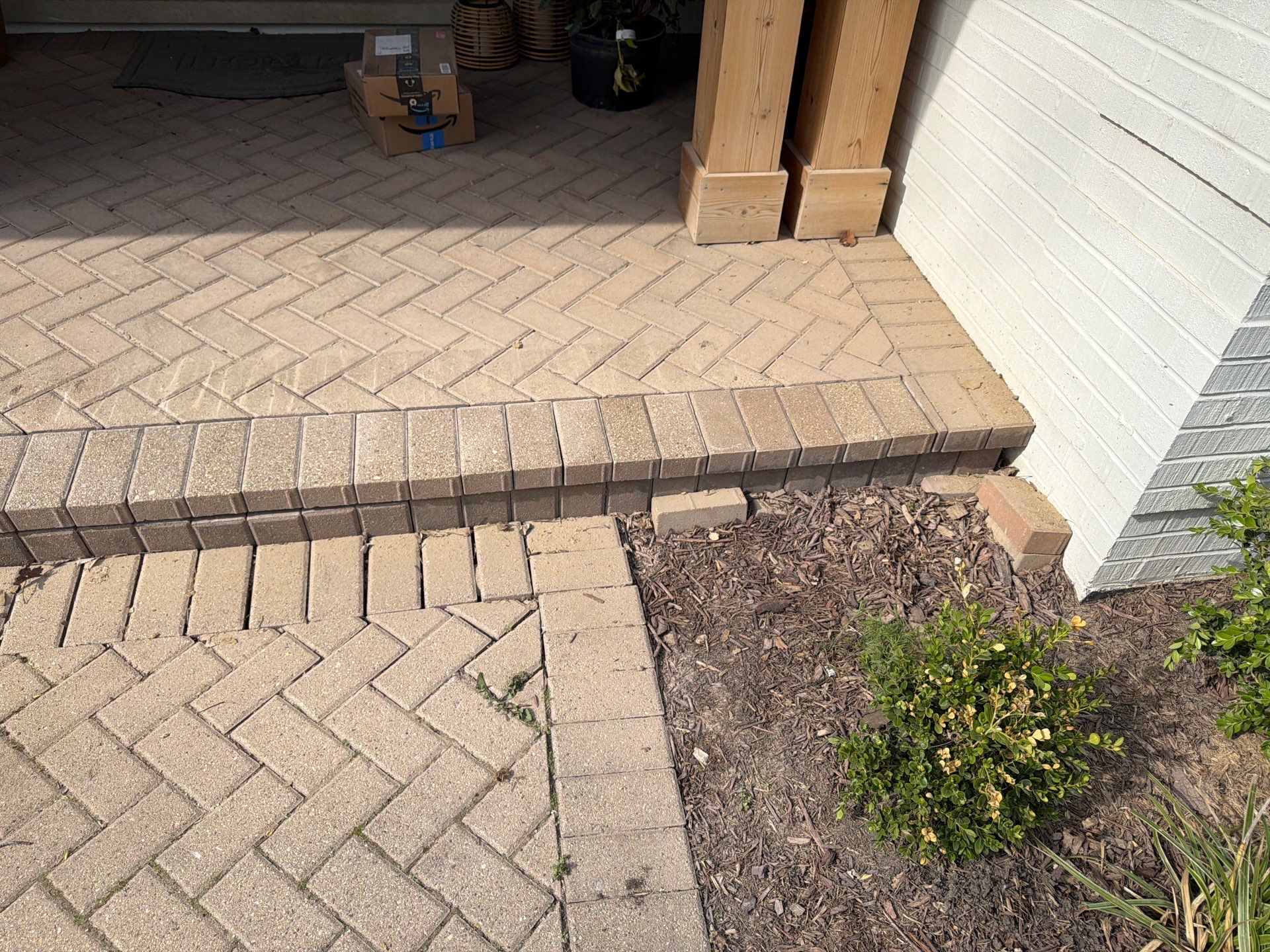Brick paver repair, cleaning and sealing by Northern Power Washing LLC.