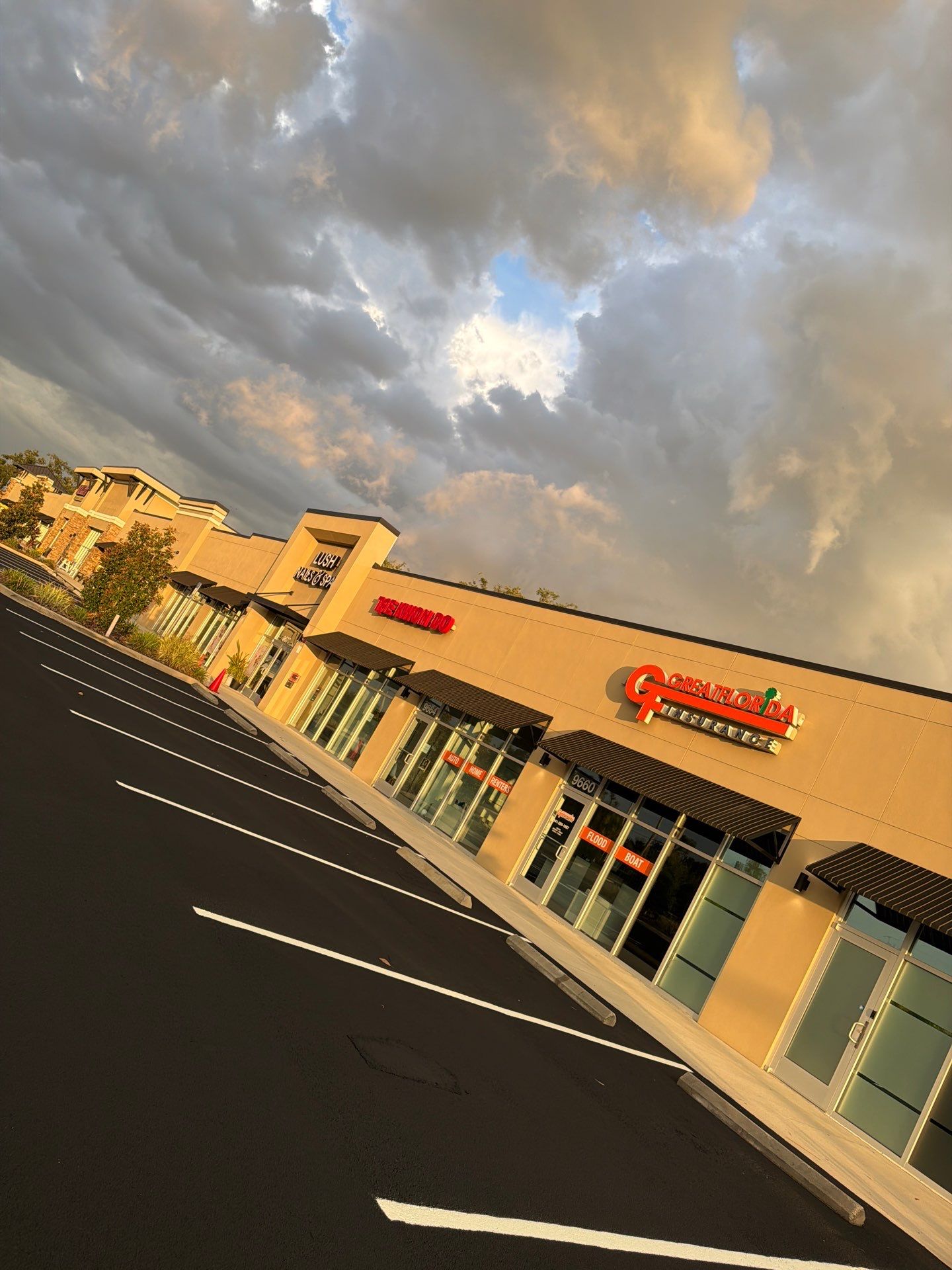 Commercial Asphalt Sealcoating and Line Striping at School House Plaza by Everline Coatings & Services - Southwest FL