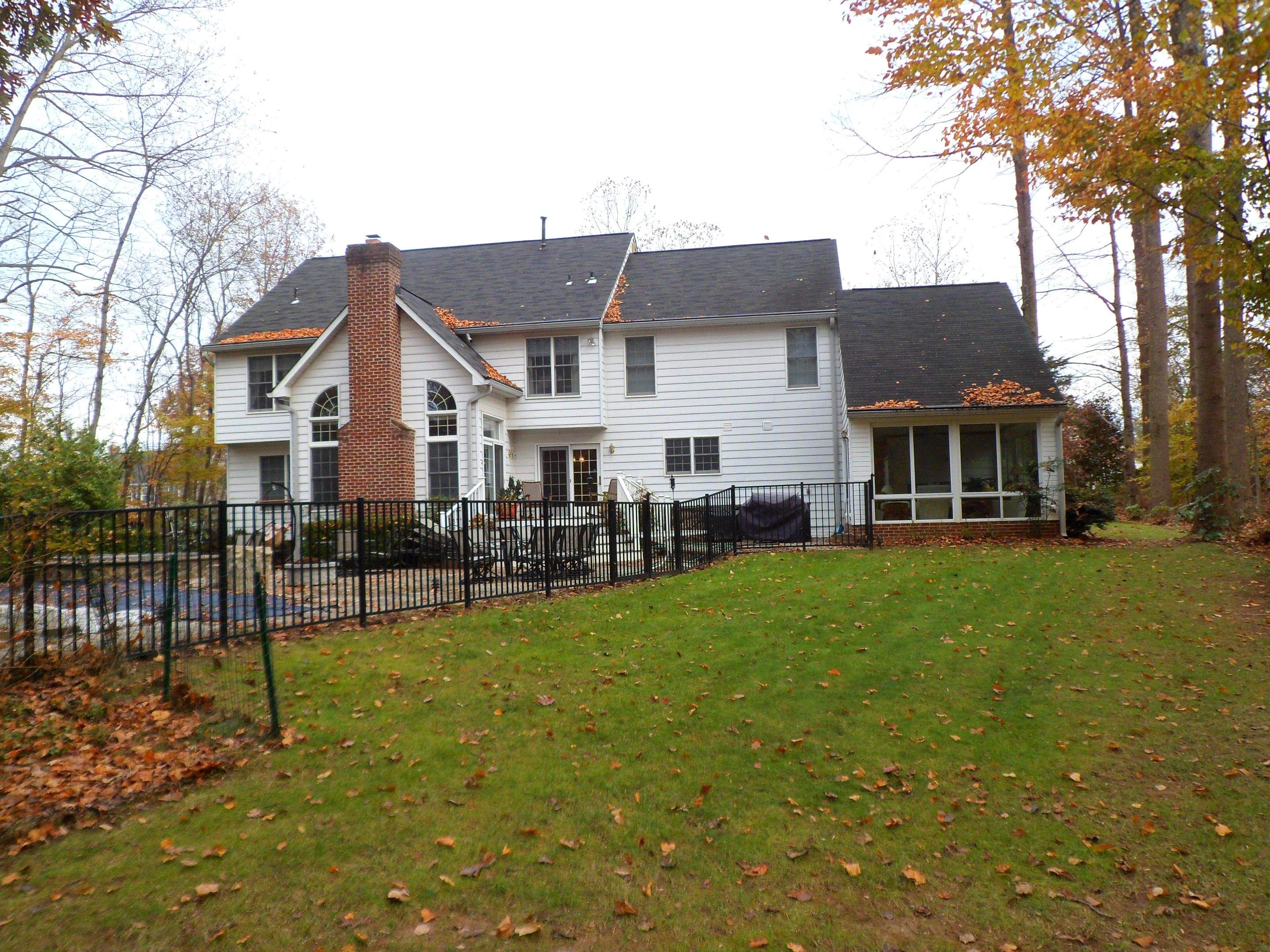 Residential Roofing Installation using Charcoal Black by Alpha Design Services