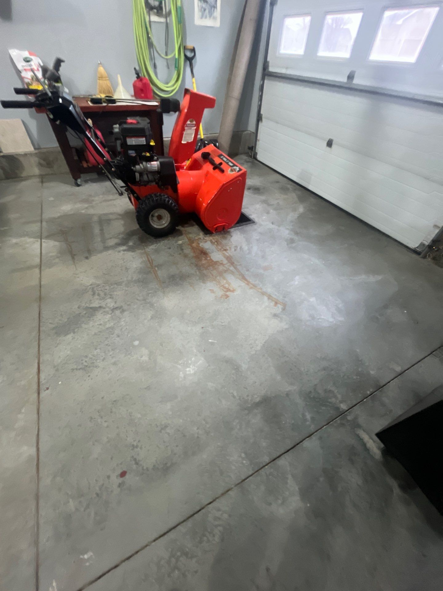 High-Gloss Epoxy Garage Floor Coating in Sioux Falls by Select Painting, Coatings & Garage Cabinets