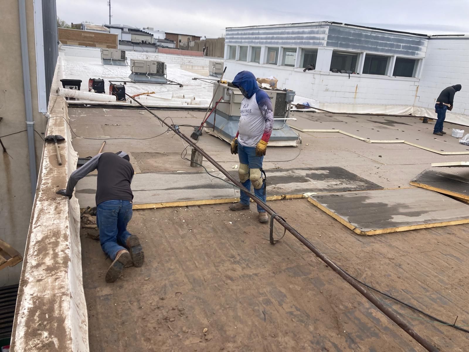 Full Roof Tear-off with new Code ISO insulation and 50 Mil Membrane by Grell Roofing, LLC