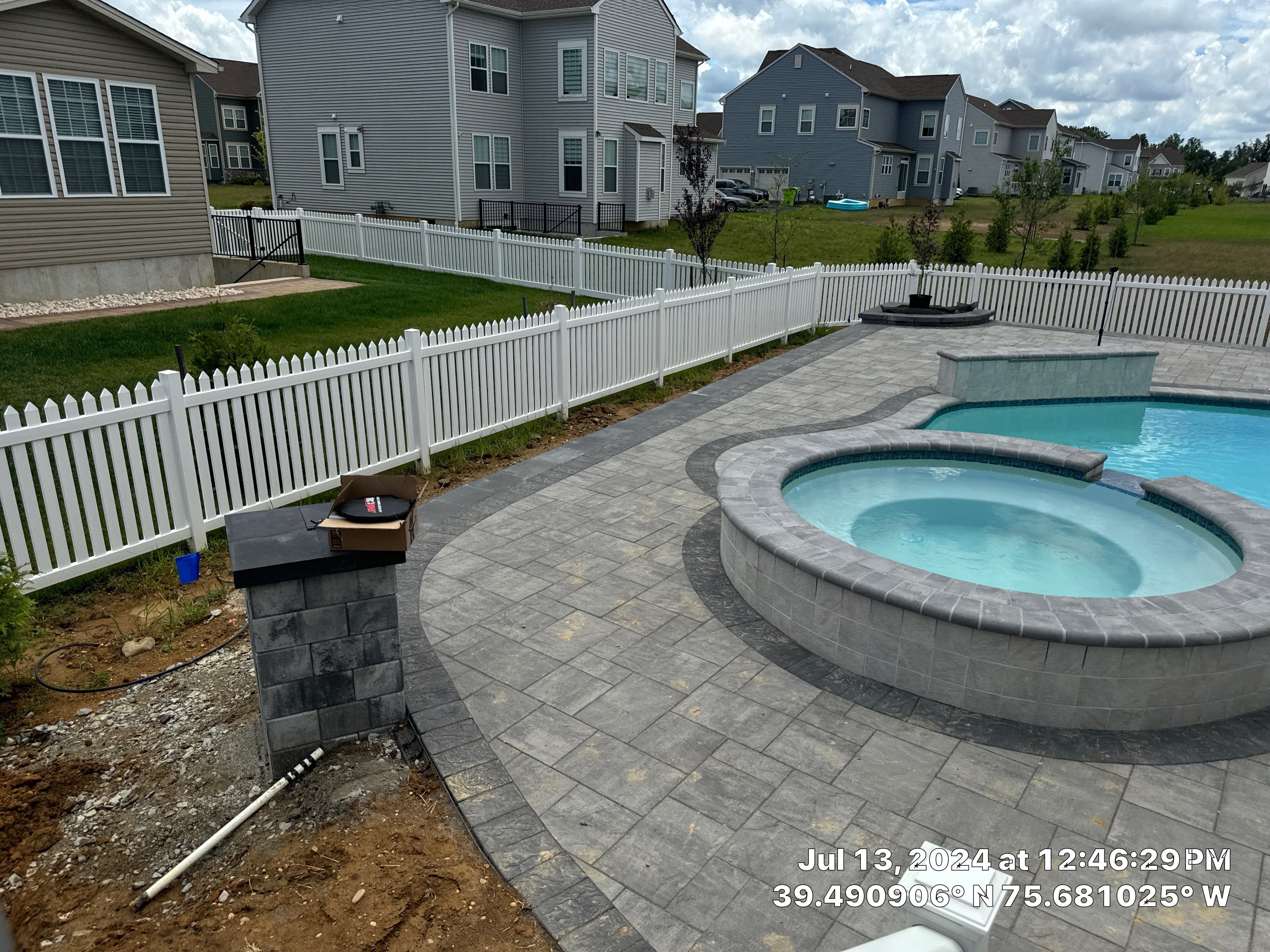Pool and Hardscape Design in Delaware | Belgard Paver Patio & Outdoor Living Space by Studio G Indoor Spaces & Outdoor Living