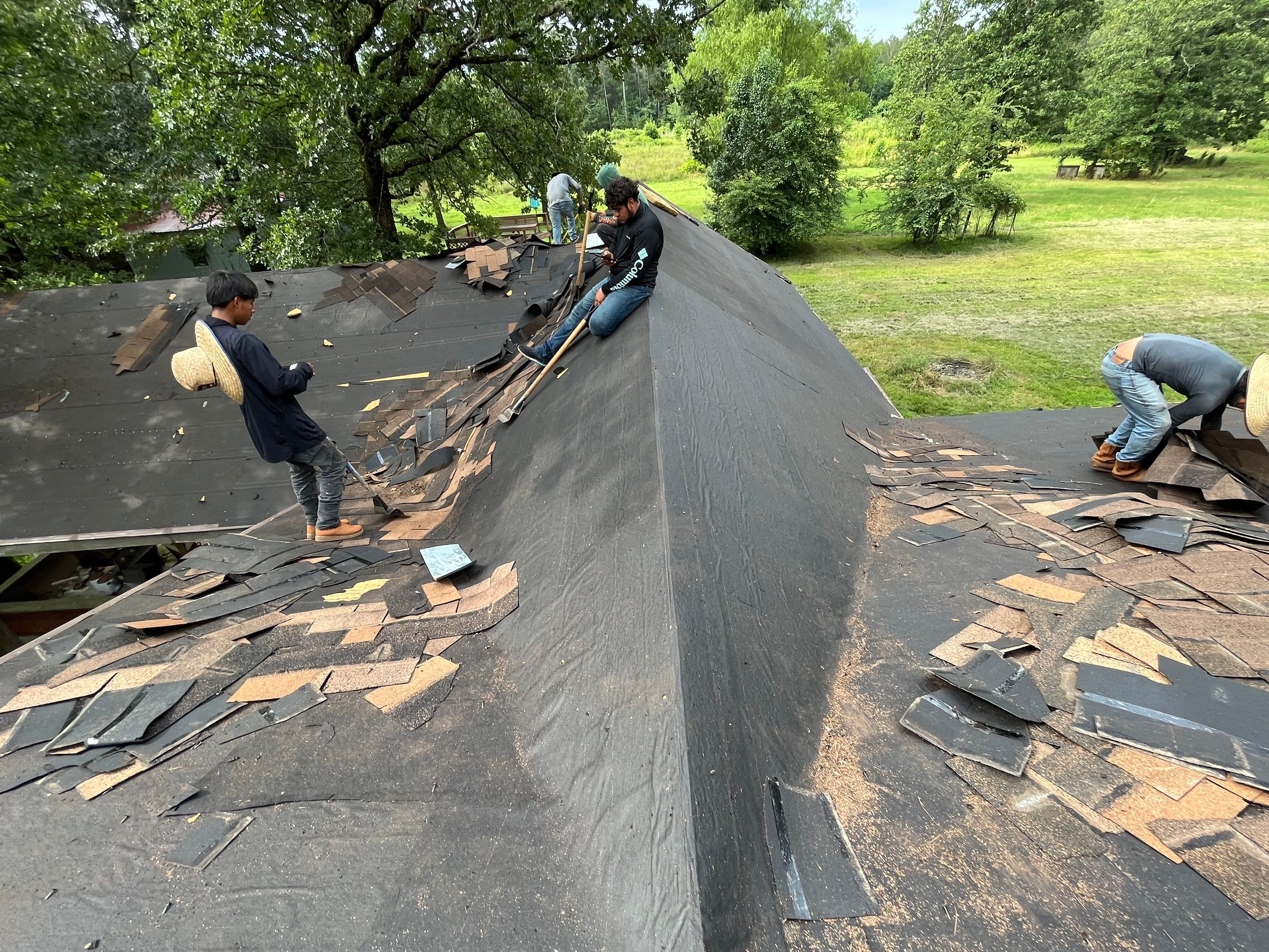 Storm Restoration Reroof: 25 Year 3-Tab Shingle by Hostetler Roofing