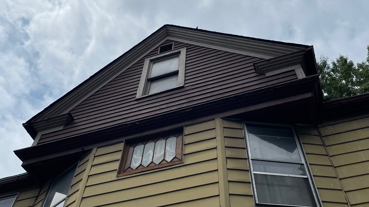 James Hardie Siding on Antique Home by Absolute Roofing and Construction