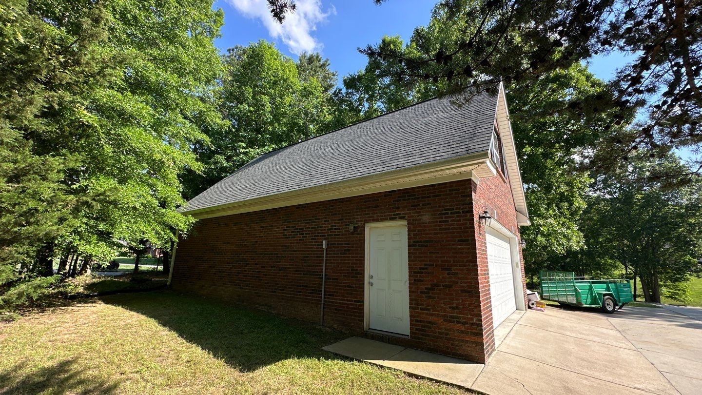 Residential Shingle Roof Replacement and Garage Installation in Rock Hill, South Carolina by Merritt Roofing LLC