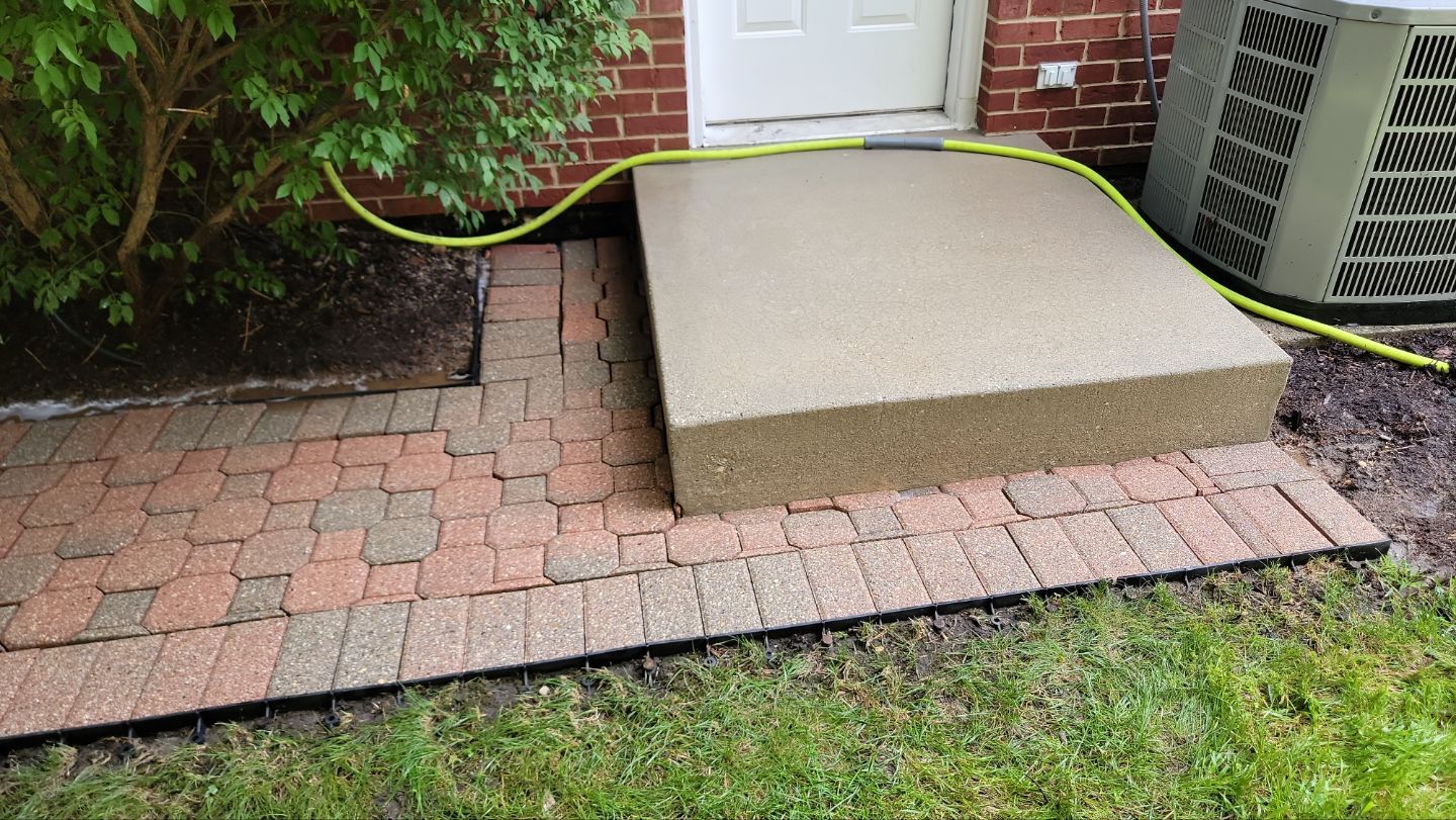 Brick paver repair, clean and seal by Northern Power Washing LLC.