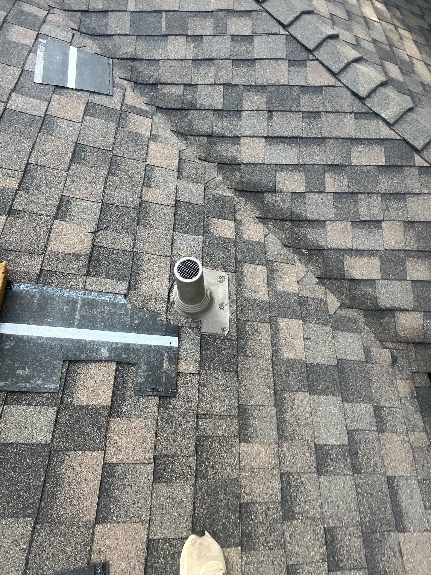 Tan exterior with IKO Driftshake by Tejas Roofworks + Restoration