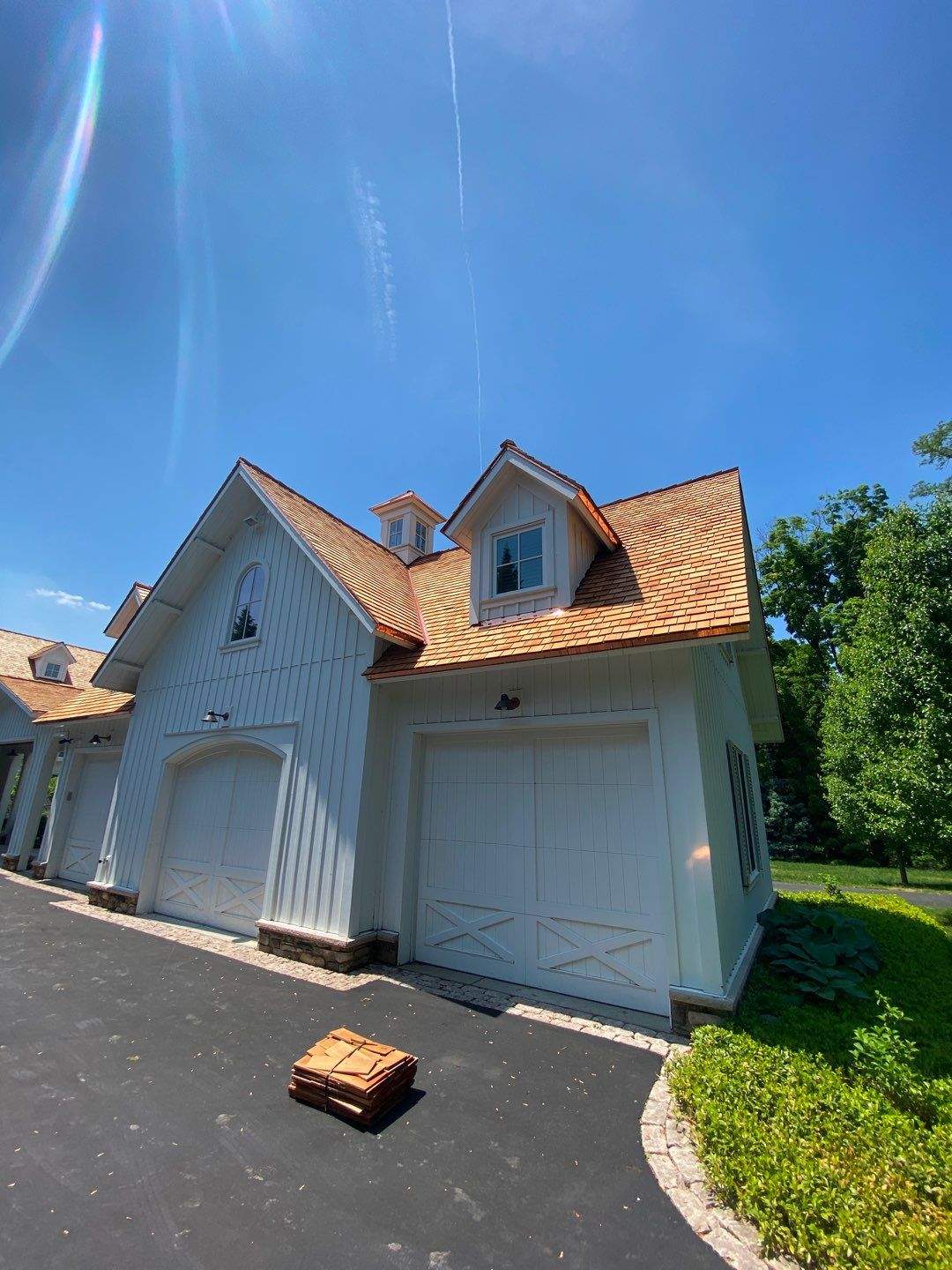 Cedar Shake Roof Replacement with Half Round Gutter Installation by Custom Installations