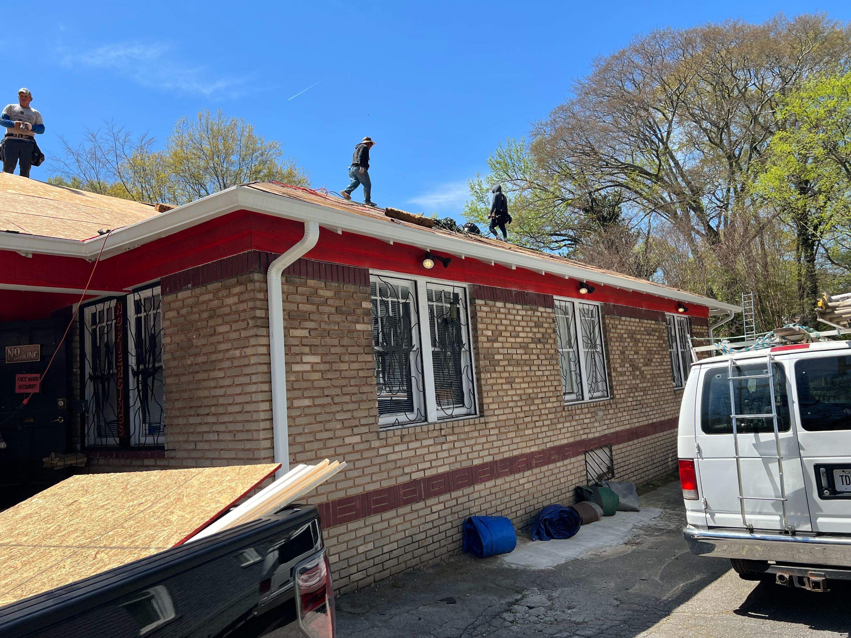 memorial tattoo roof & gutter replacement by Nailed It Roofing & Remodeling LLC