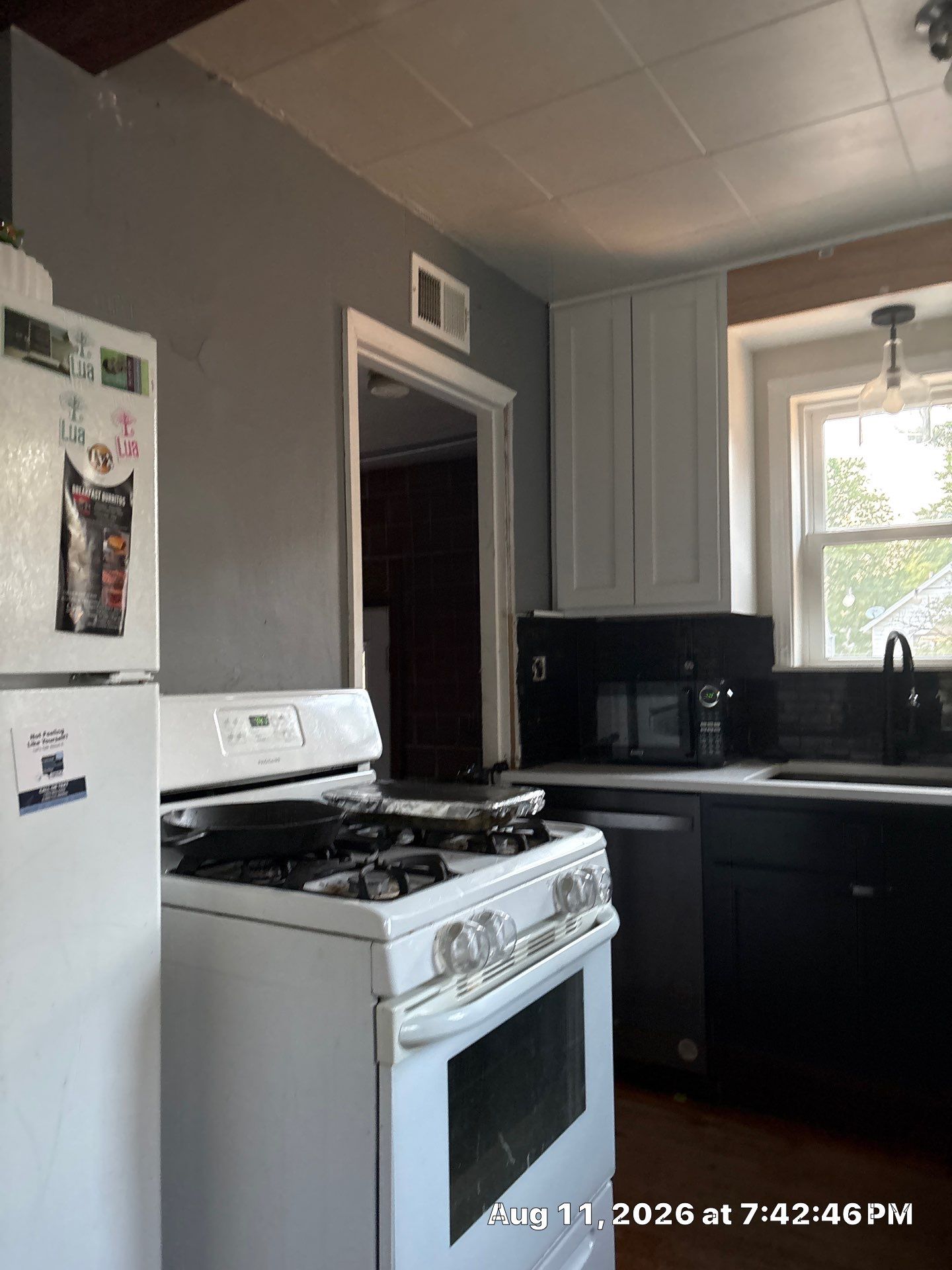 Two-Tone Kitchen Remodel with Black Subway Tile in Lincoln by CompanyCam Sales Demo