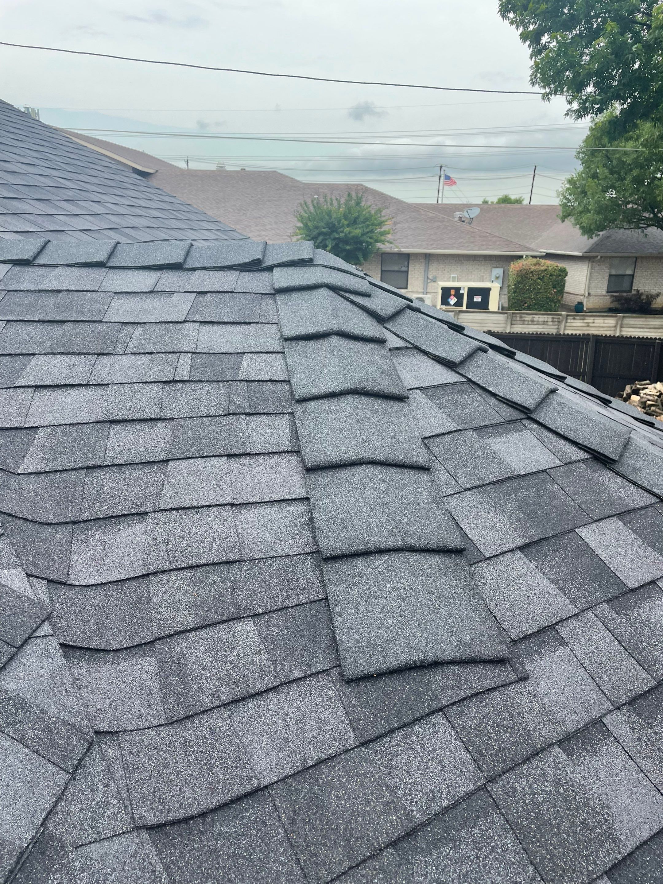 Residential Roofing Installation using CertainTeed Landmark MaxDef Moire Black by OneSource Roofing and Restoration