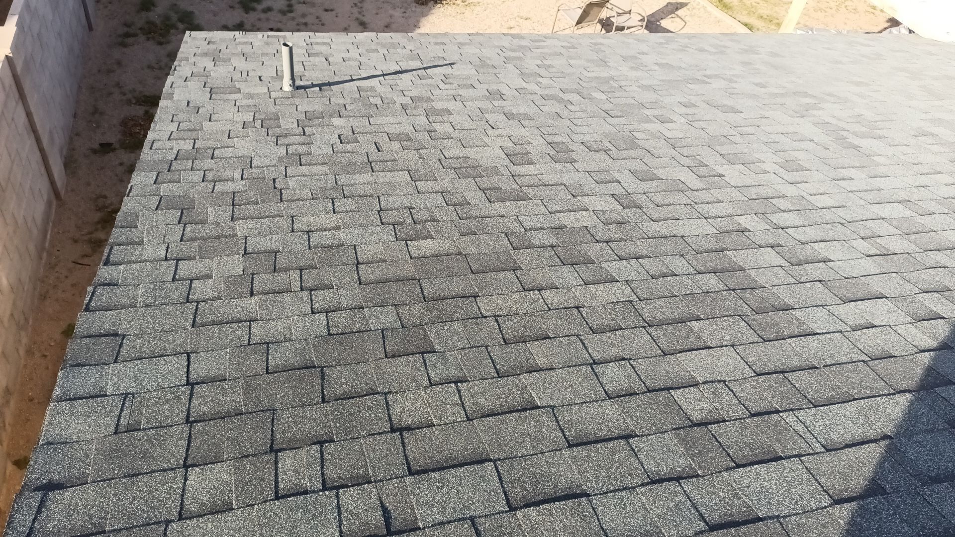 Estate Gray Shingles by Reimagine Roofing