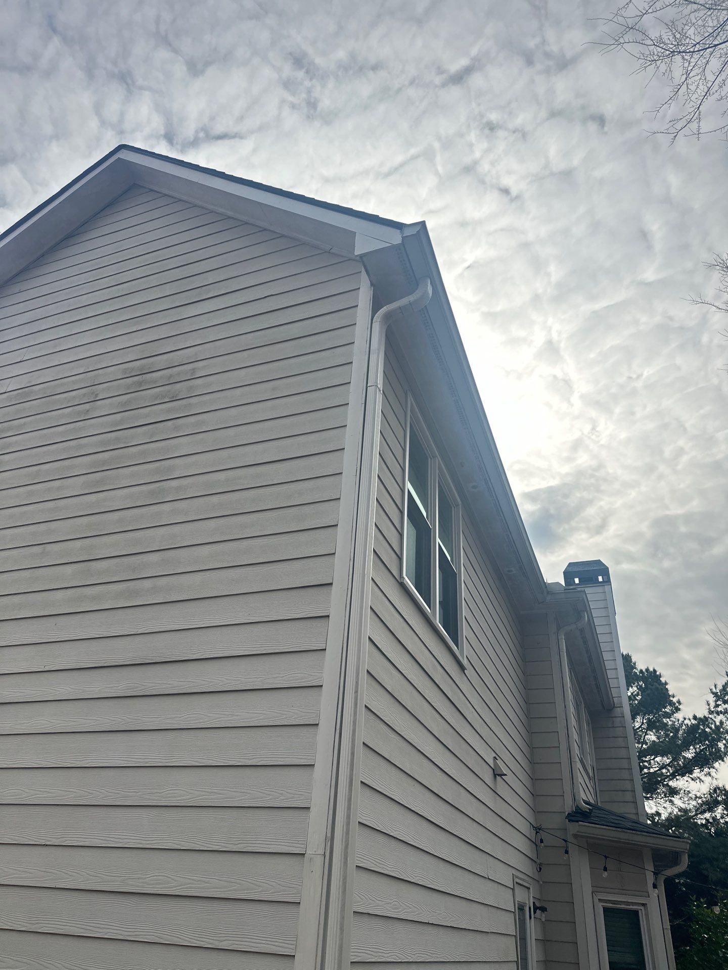 Marietta, GA Chimney Siding, Fascia, and Soffit Replacement using James Hardie Lap Siding, Hardie Trim, and Hardie Panel by Nelson Exteriors 