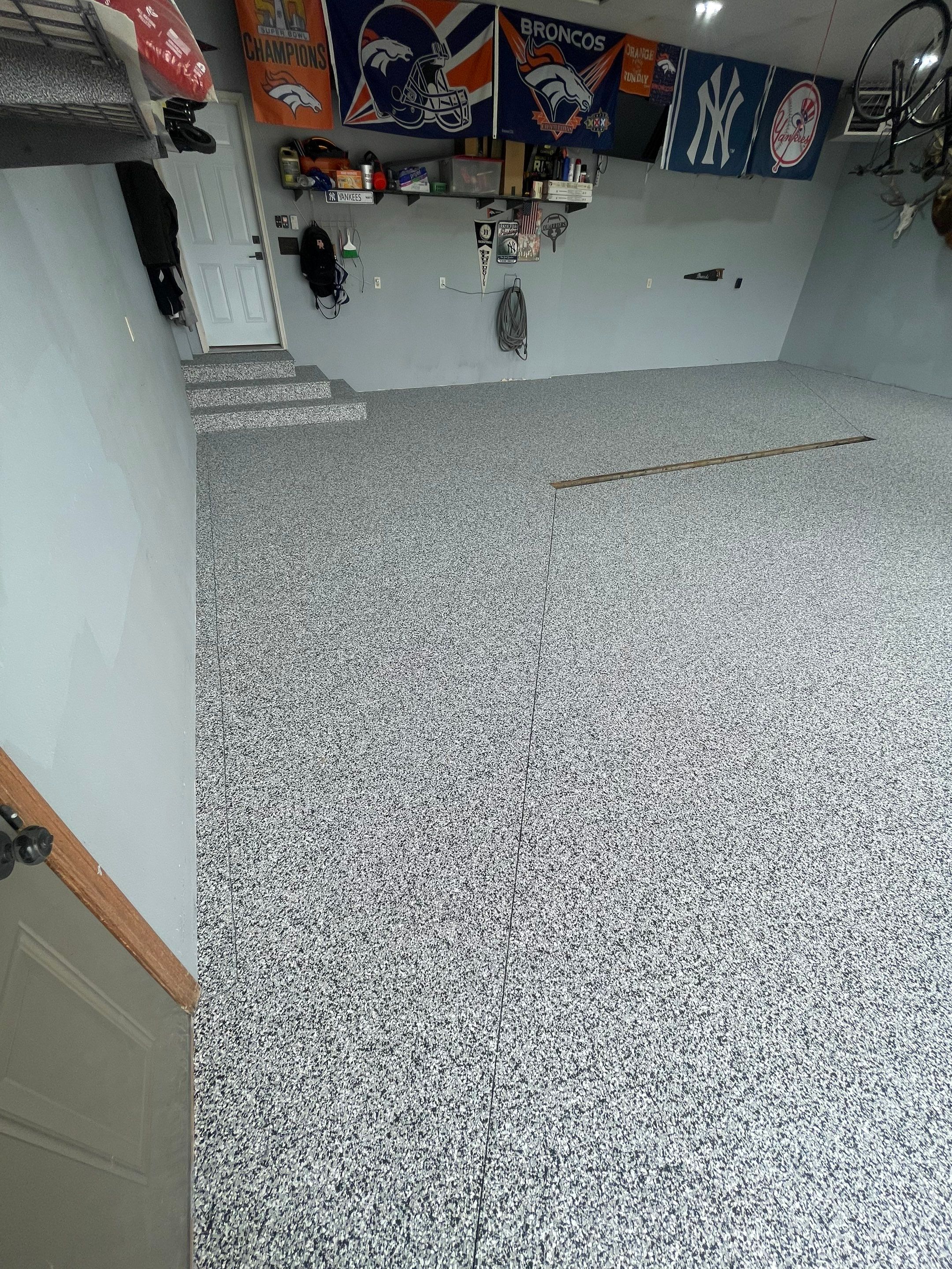 Full Garage Floor Epoxy Coating Installation in Dell Rapids by Select Painting, Coatings & Garage Cabinets