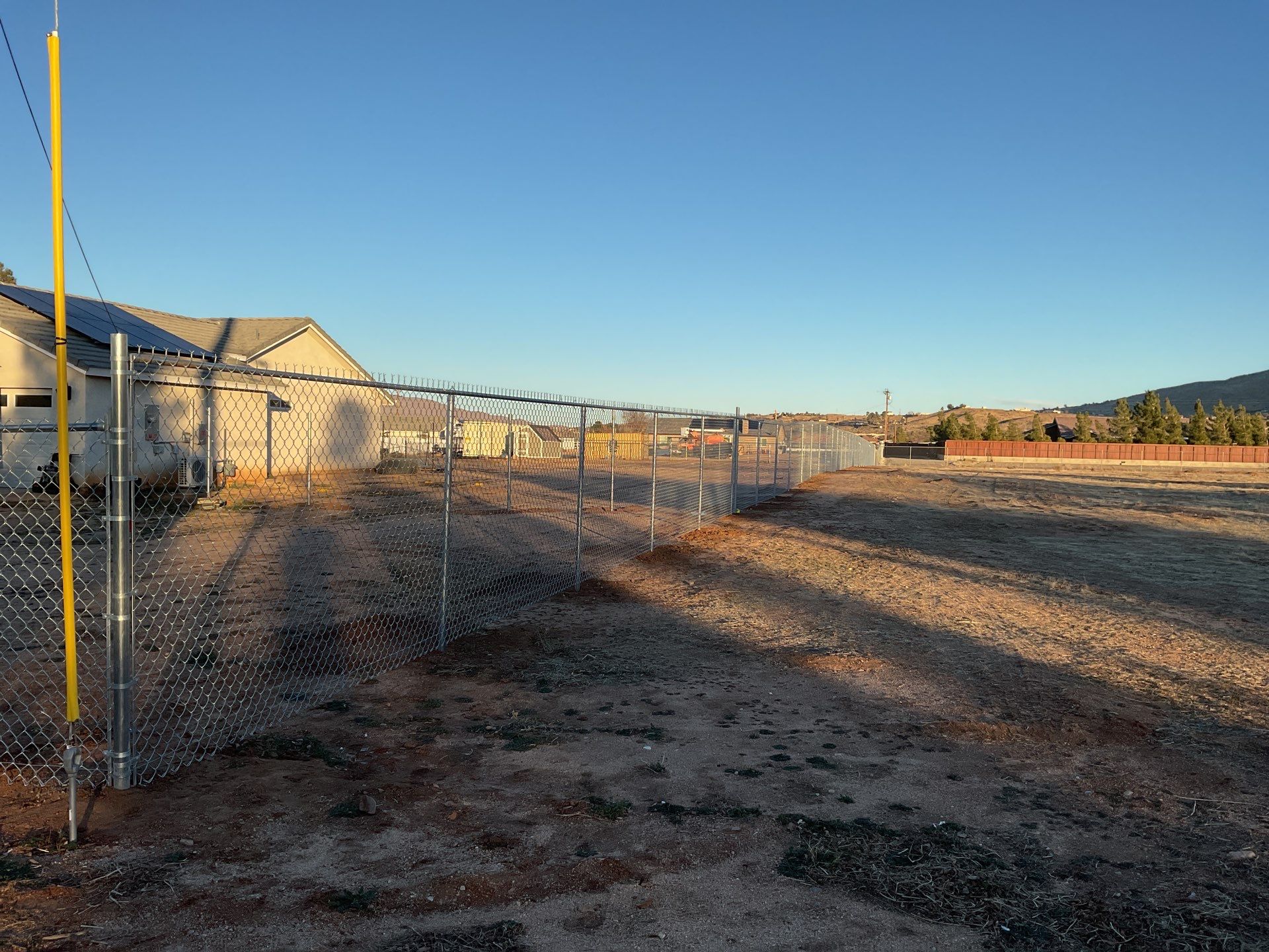 6ft and 5 ft chain link by Fence Guys Inc. 