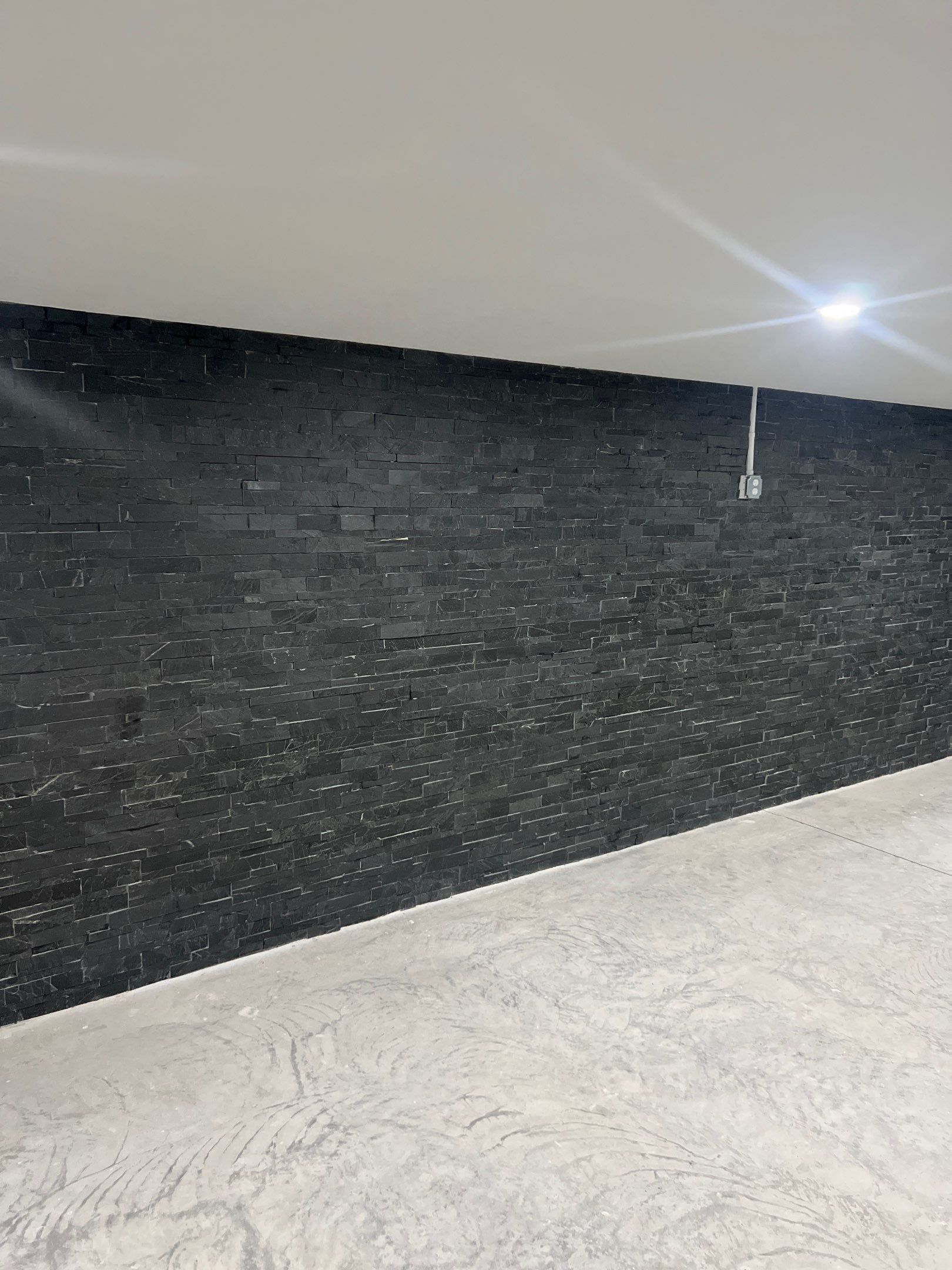 Carpet & Stack stone by Vrmmm Flooring