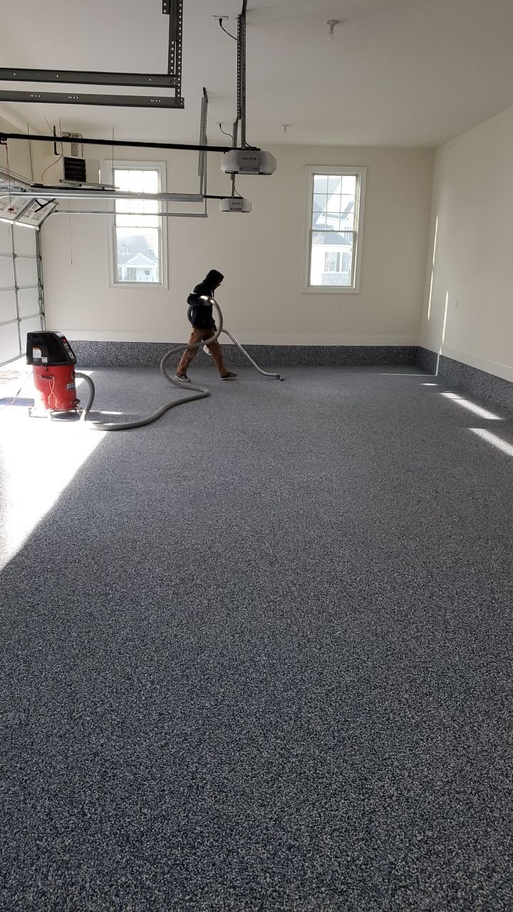 Orbit Penntek Garage Floor by Spectrum Painting, LLC